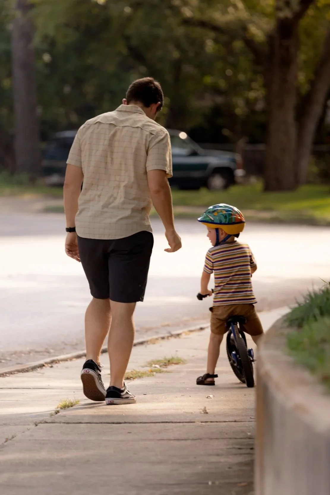 Father and sun on a bike ride