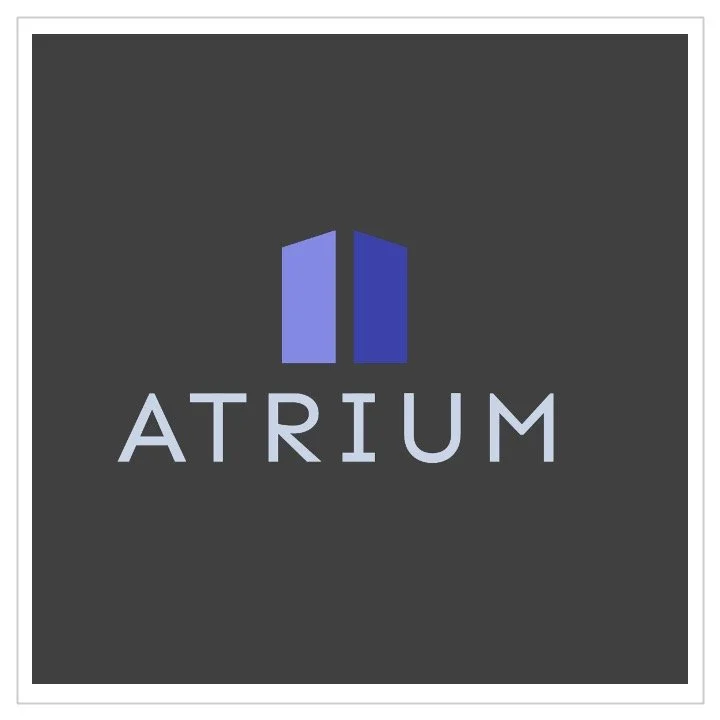 Atrium logo featuring two stylized blue and purple building-like shapes above the word 'Atrium' on a dark gray background.