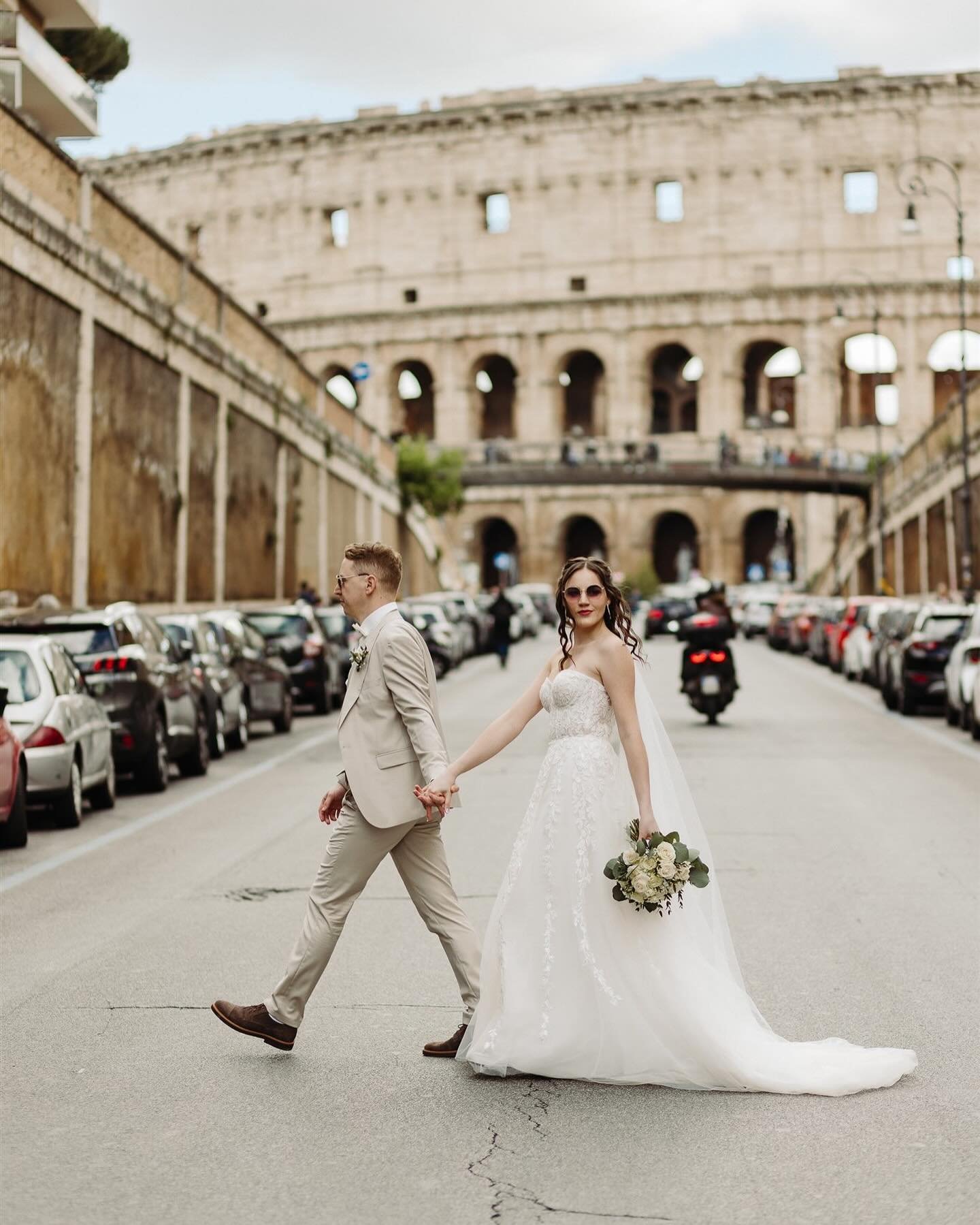 Lost in the echoes of ancient love, amidst Rome&rsquo;s majestic Colosseum.