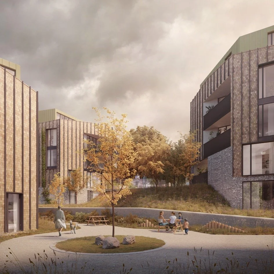 3/3 - The unique building forms nestle into the natural topography, resulting in grounded buildings that feel spatially generous and visually coherent. 

The scheme includes a mix of low-rise family houses, apartment buildings, and traditional dwelli