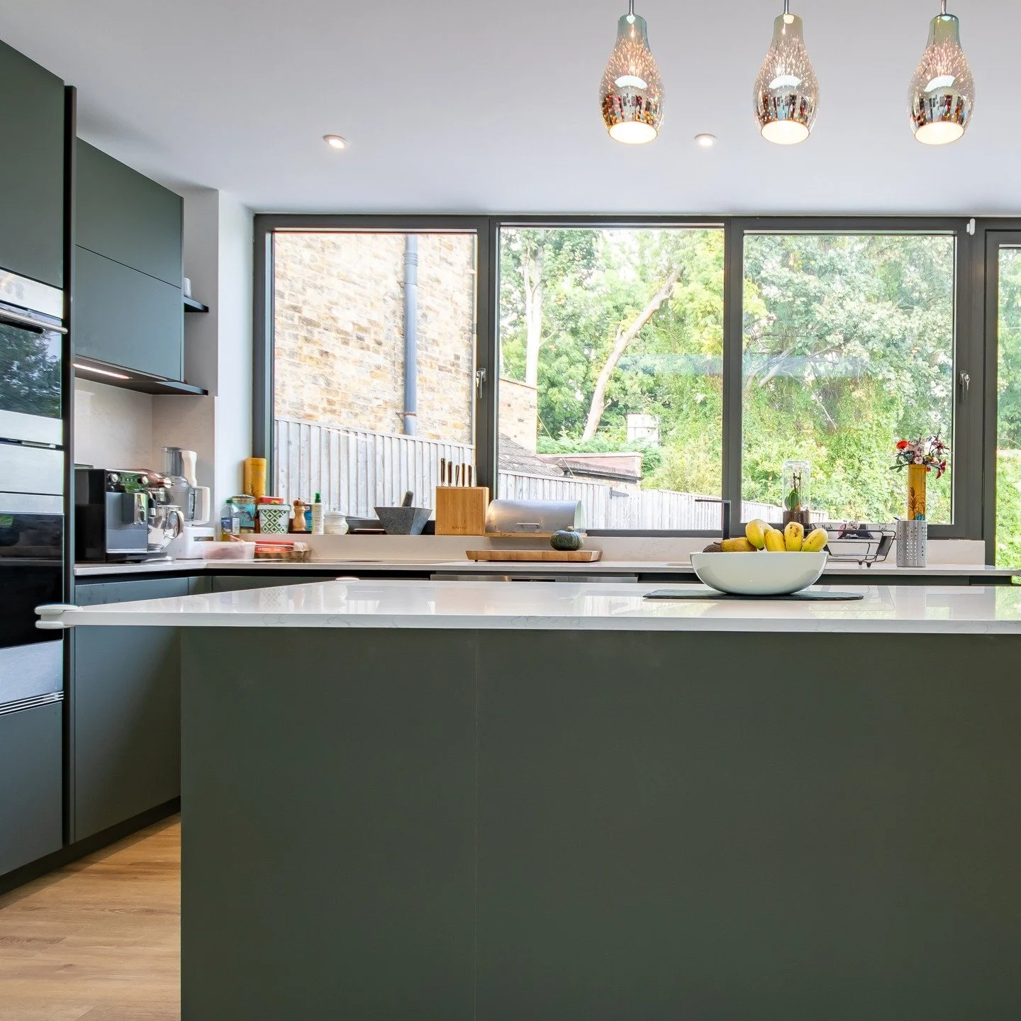 2/3 - Originally a series of cellular spaces organised across a narrow rectangular footprint at ground floor, the rear and side extensions have added much needed space to create a large open plan kitchen and dining space, with separate living and stu