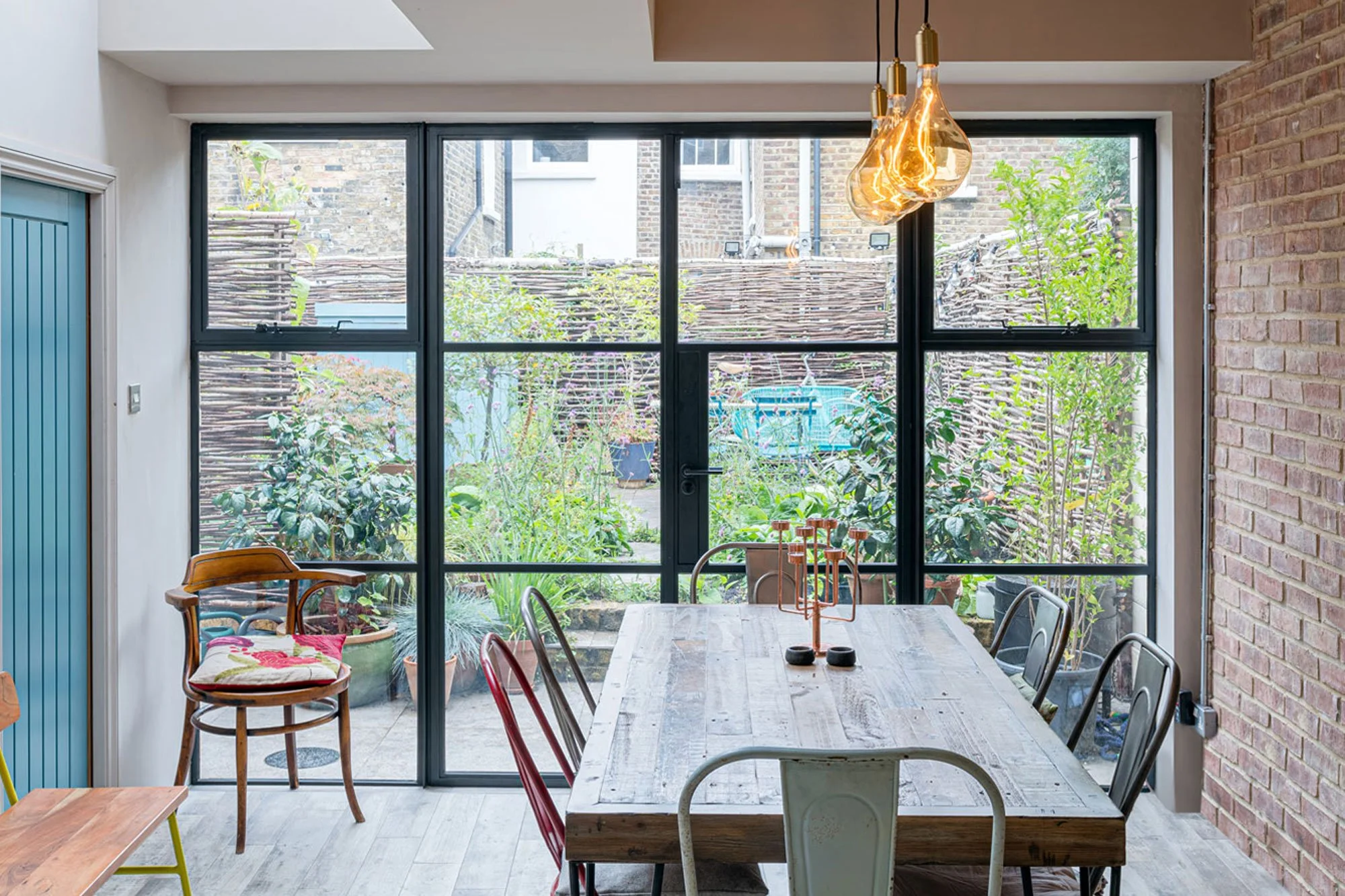 Rear extension with dining area with view through to garden - Marjoram Architects 187 Railton Road project