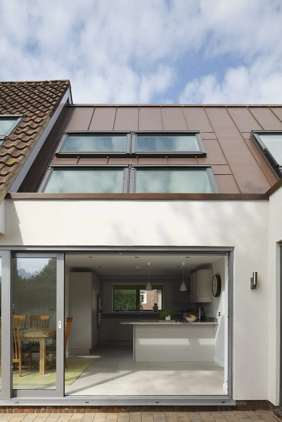 Rear extension through to kitchen and dining area with rooflights - Marjoram Architects 9 Down Barn Close Project