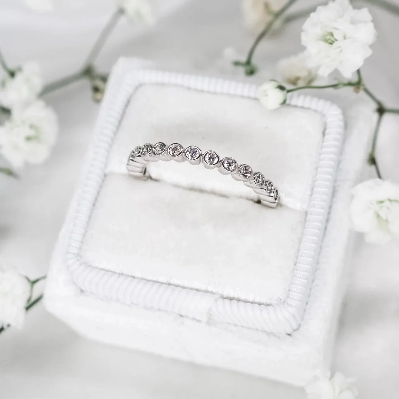 Bezel Half Eternity Ring

Available in 9ct Yellow, White and Rose Gold, 18ct Yellow, White and Rose Gold and Platinum.
Available with Lab or Natural Diamonds