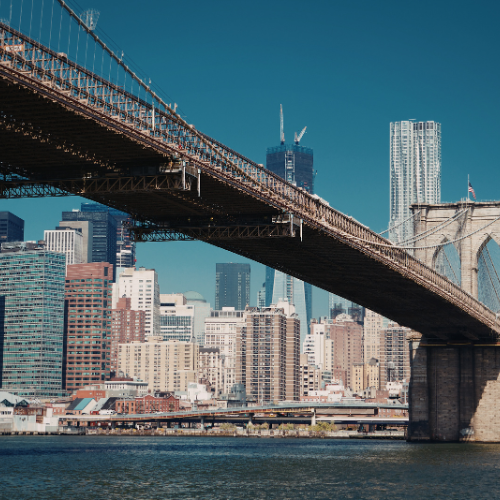 Brooklyn Bridge with New York City skyline in the background on a clear day