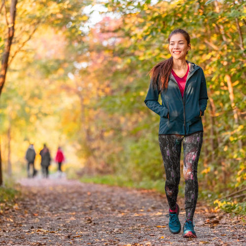 Girl walking in the woods
