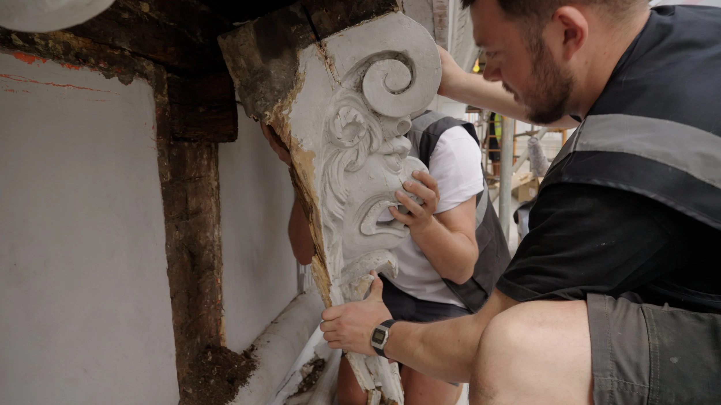 Delicate work - Kensington Palace team, cameras and restoration specialists all observing in 30 degree heat. 