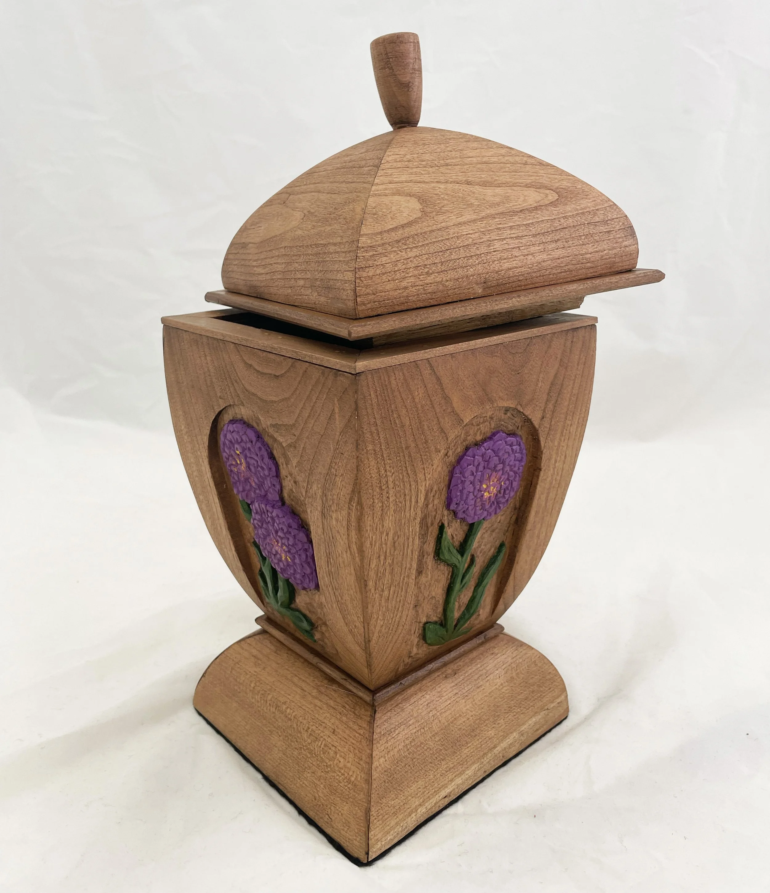 Urn for Leah in carved and painted cherry
