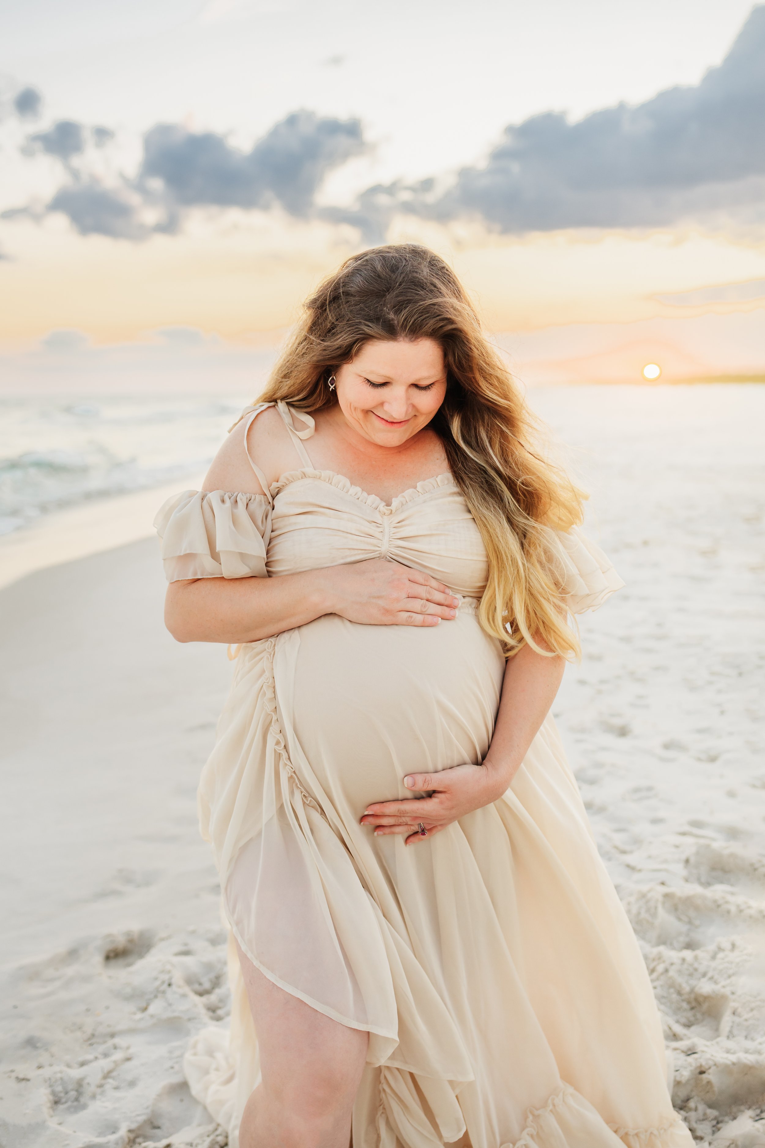 Young family having a photo session with a Pensacola Beach Photographer and Navarre Beach Photographer in Pensacola, FL