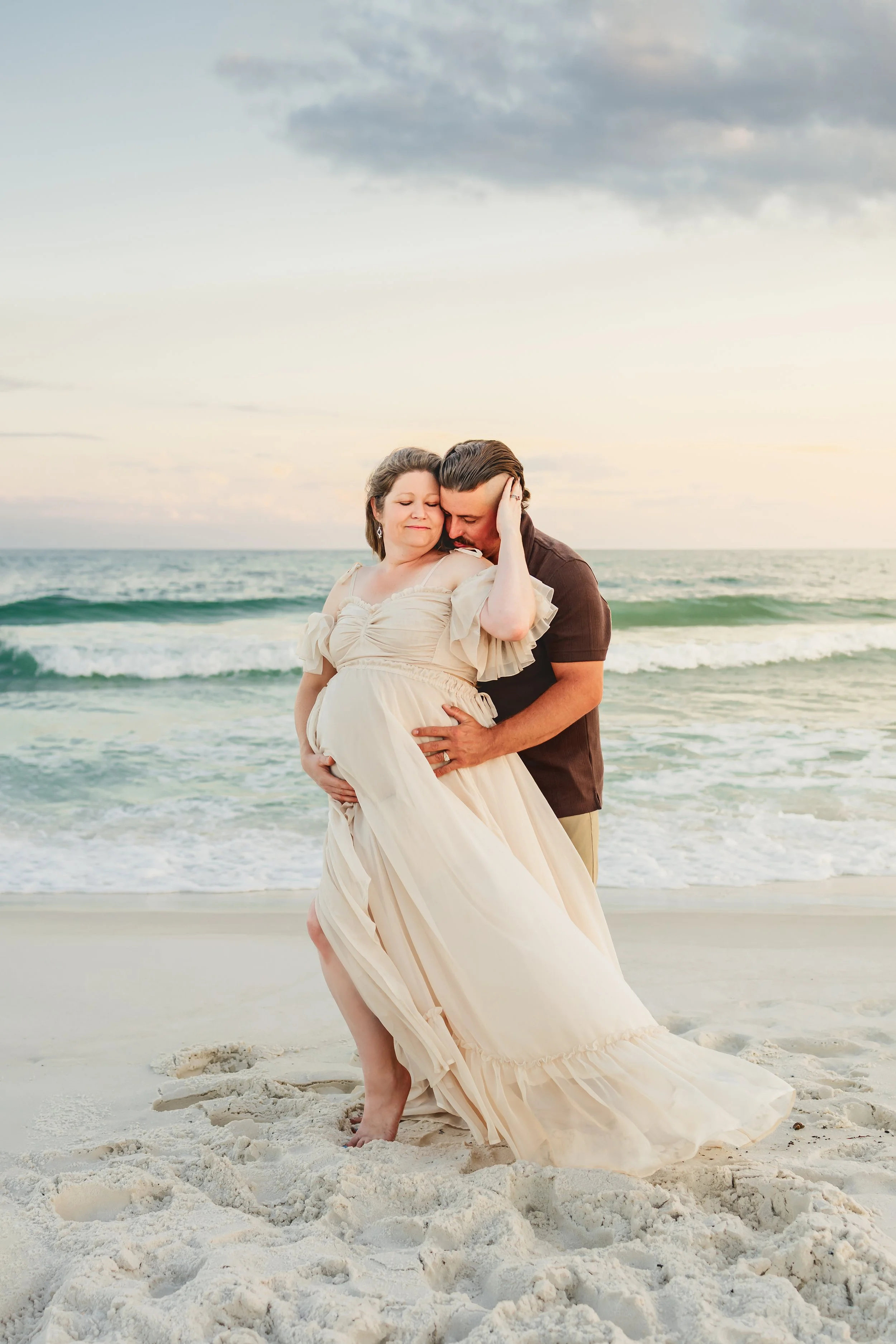 Young family having a photo session with a Pensacola Beach Photographer and Navarre Beach Photographer in Pensacola, FL