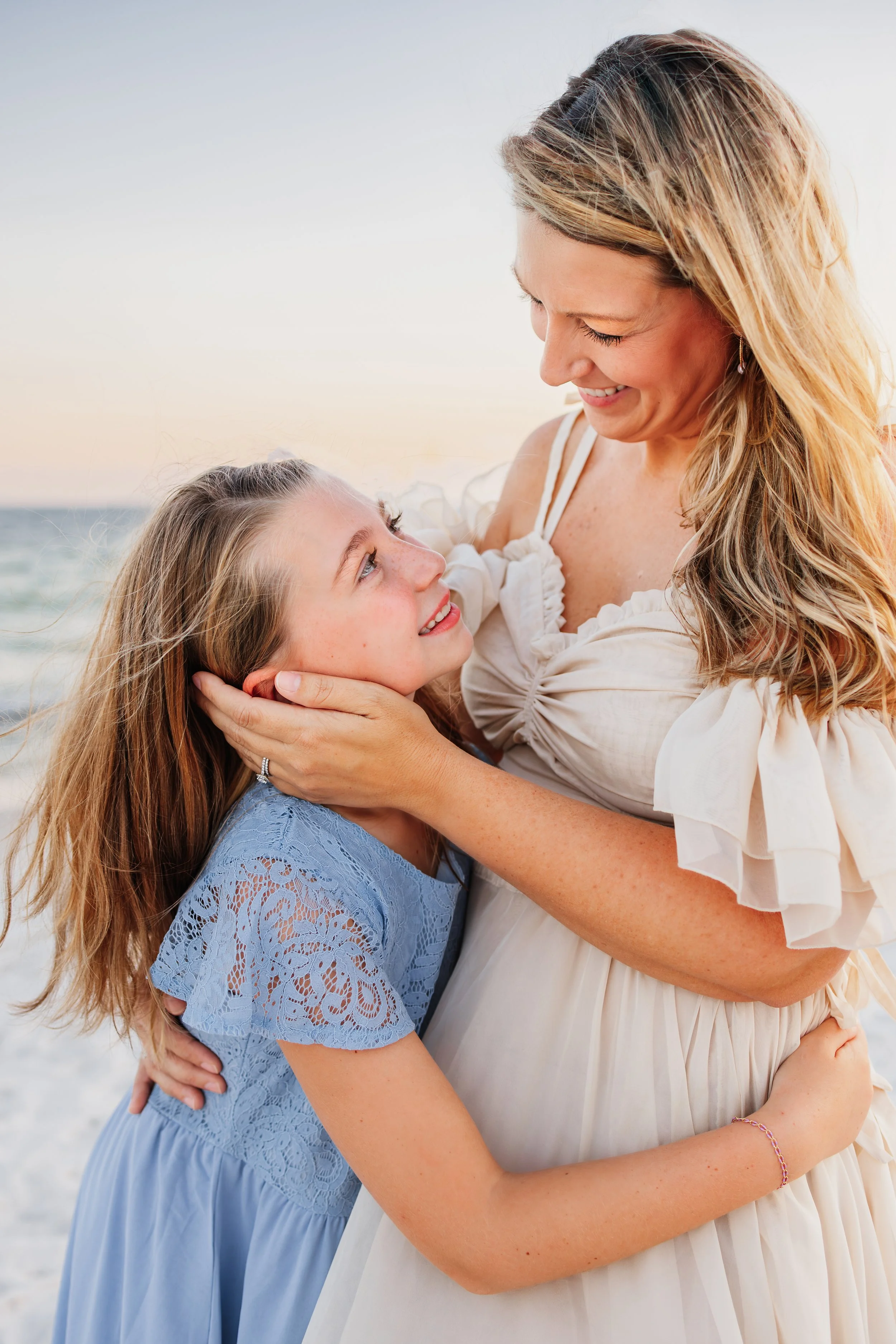 Young family having a photo session with a Pensacola Beach Photographer and Navarre Beach Photographer in Pensacola, FL
