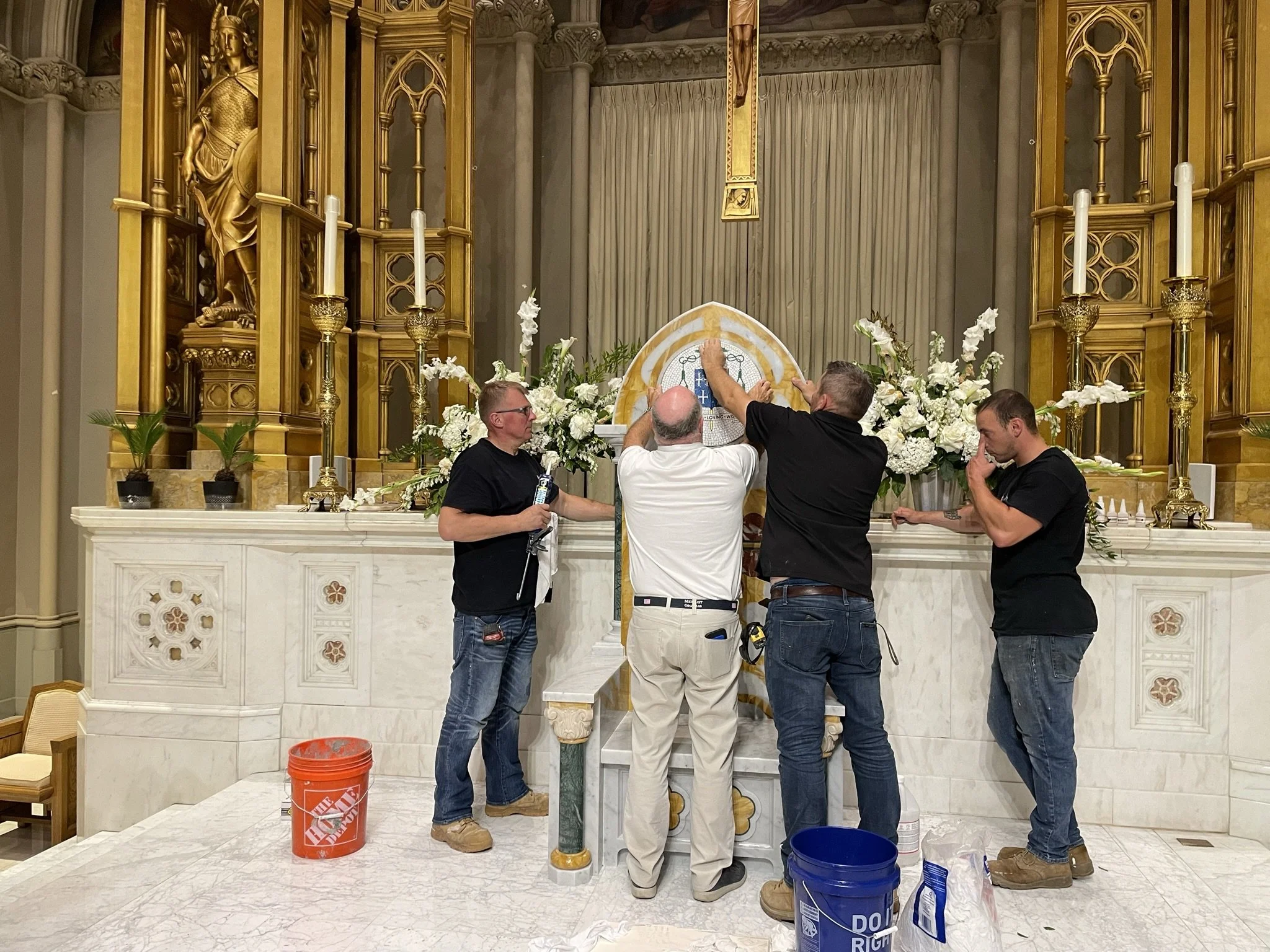 The installation of the Bihop's Coat of Arms