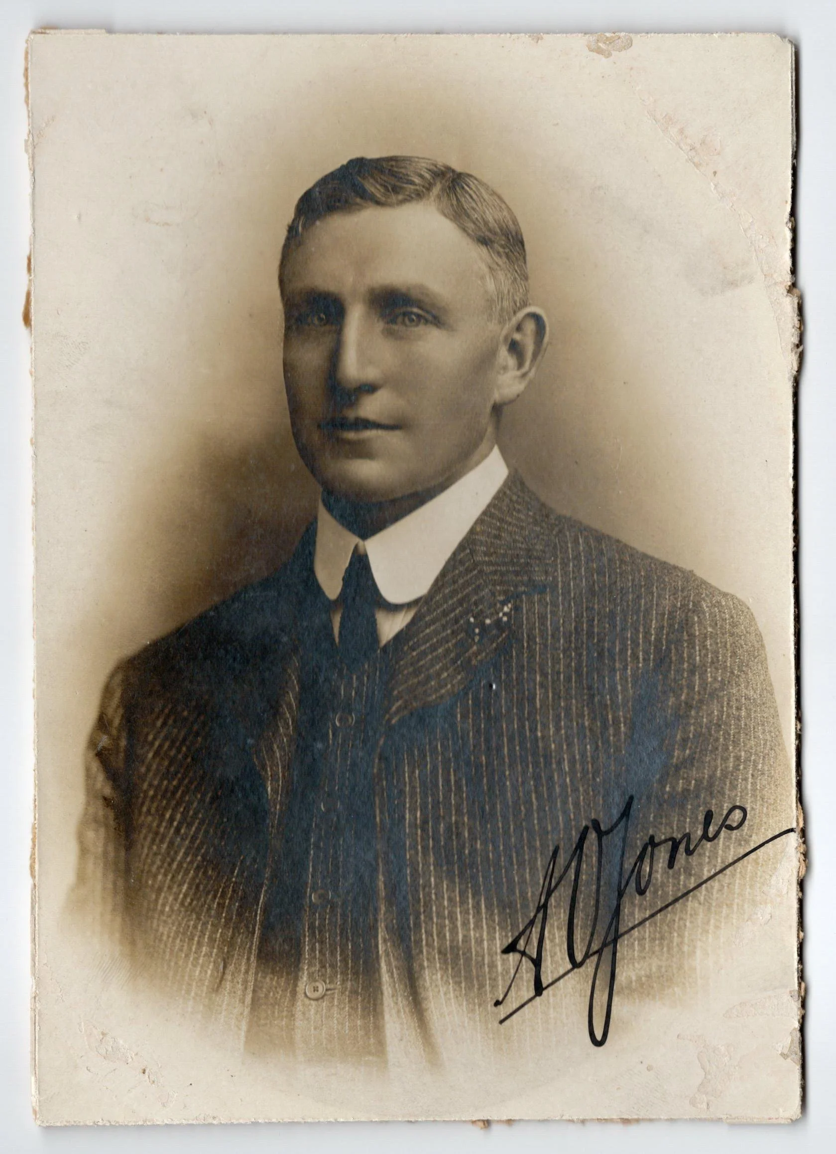 Lot 172
Arthur Owen Jones. Nottinghamshire & England 1892-1914. Excellent studio portrait of Jones, the M.C.C. Captain, taken on the M.C.C. tour of Australia in 1907/08. Jones is pictured wearing pin stripe suit and tie. The photograph nicely signed