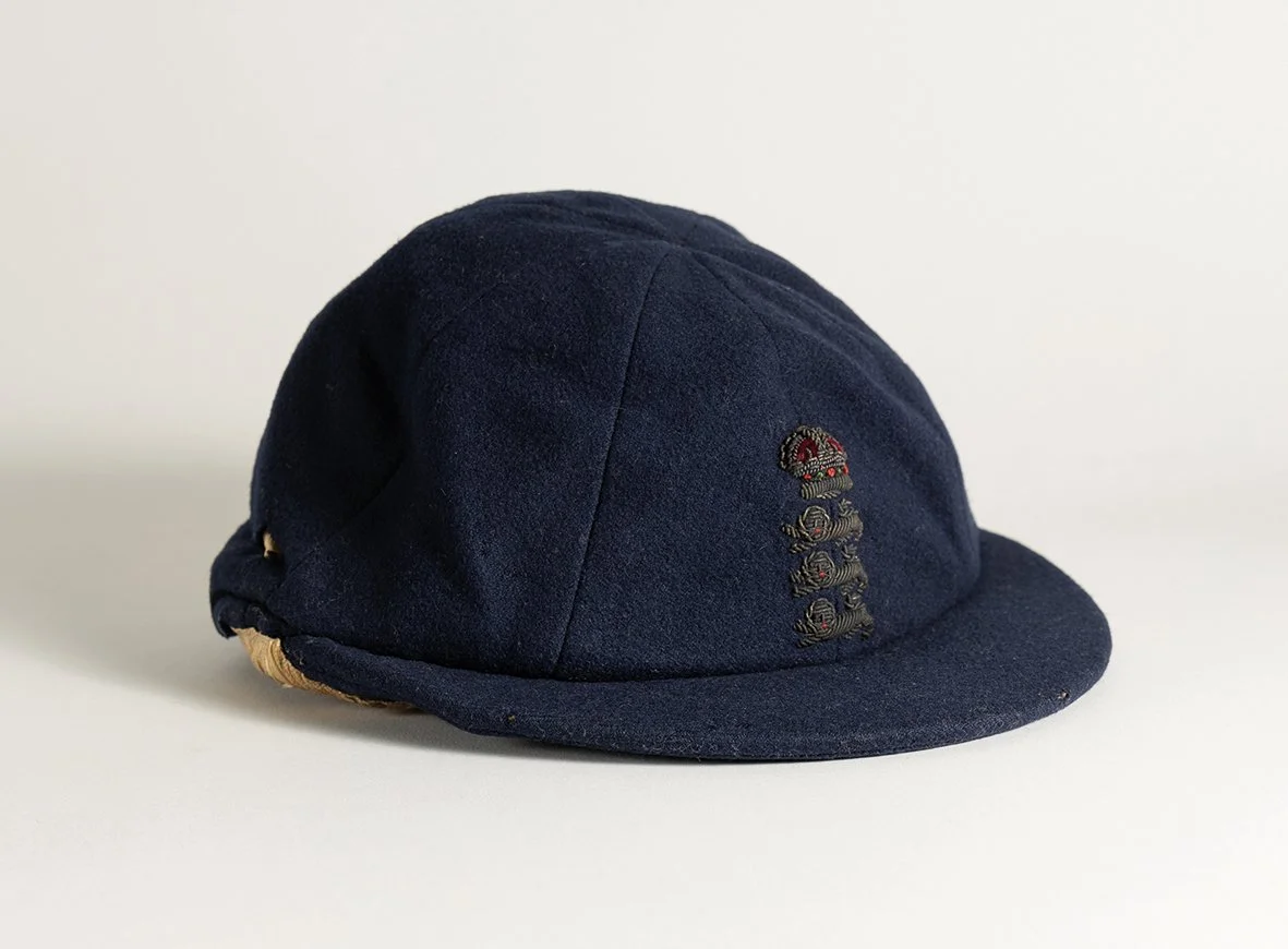 Lot 764

Hedley Verity. Yorkshire & England 1930-1939. England navy blue cloth Test cap with raised wired emblem of the three lions and crown to front. The cap made by E.C. Devereux of Eton, Bucks with 'H. Verity' handwritten in black ink to inner la