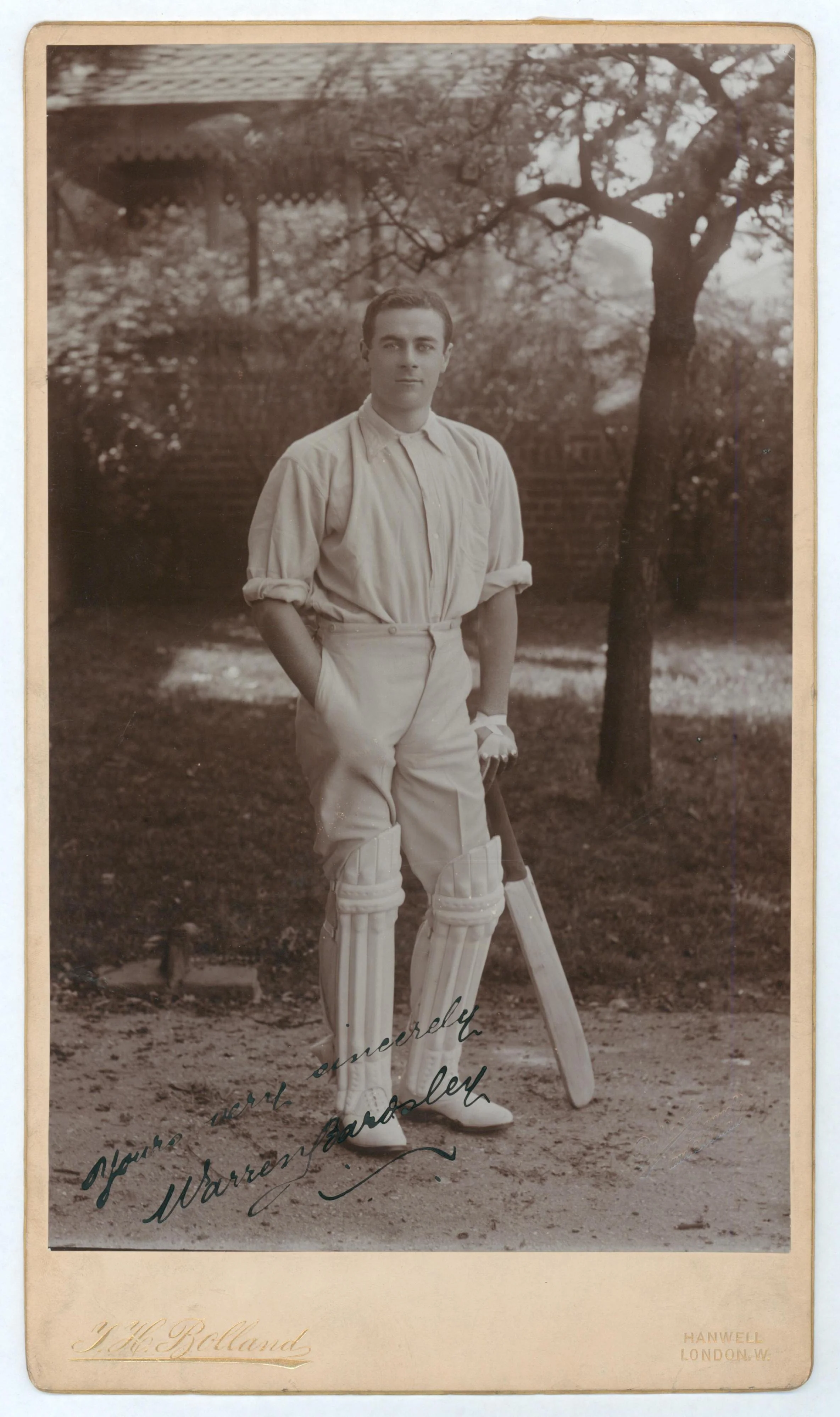 Lot 503
Warren Bardsley. New South Wales & Australia 1903-1927. Excellent extra large sepia 'Imperial' size cabinet card of Bardsley standing full length wearing batting attire and leaning on his bat. Very nicely signed in black ink to the photograp