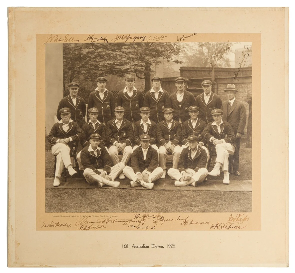 Lot 267

Australia tour of England 1926. Impressive official sepia photograph of the Australian team who toured England in 1926, seated and standing in rows, wearing cricket attire and all dressed in their touring caps and blazers. The photograph, by