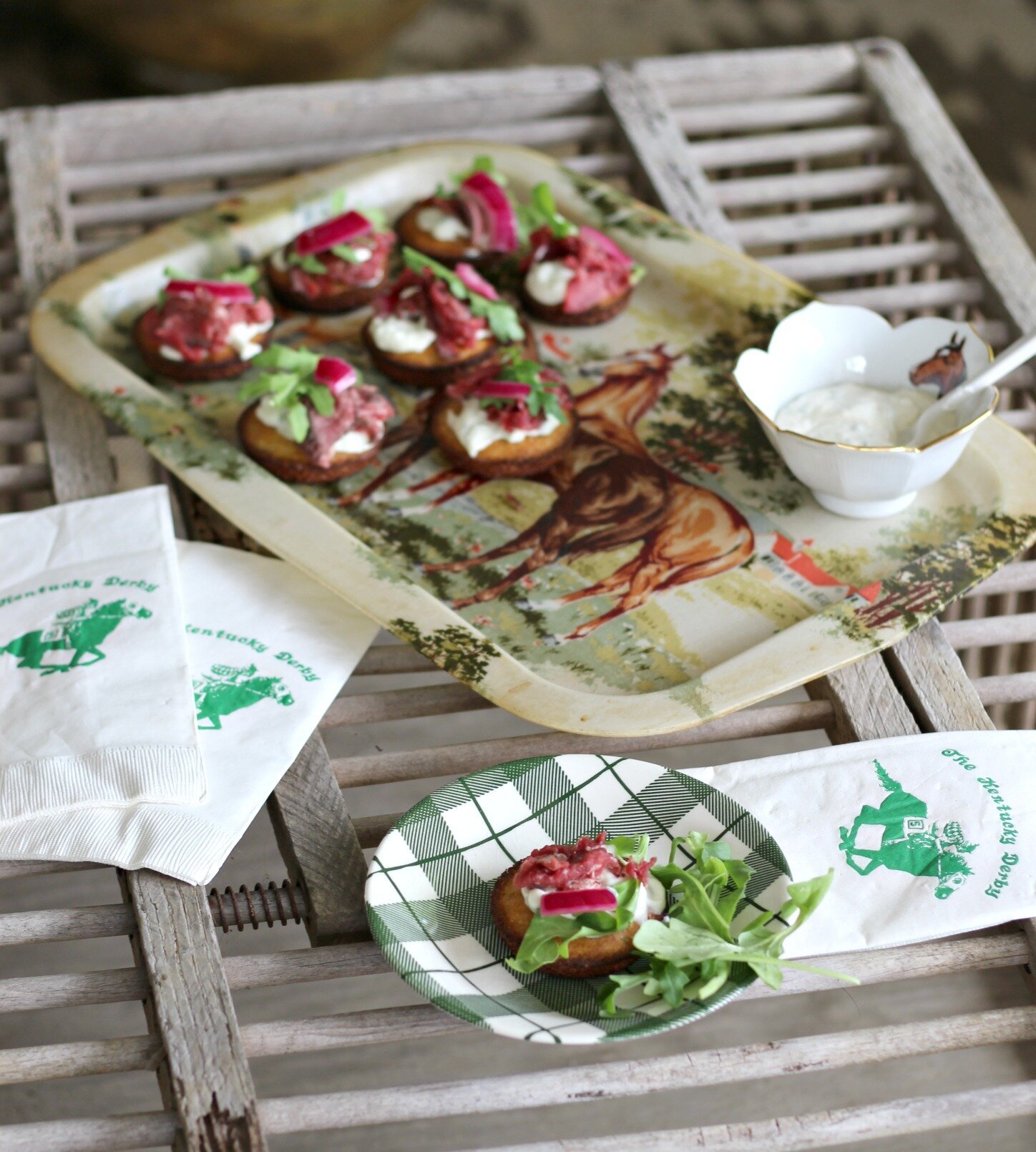 Beef Tenderloin Cornbread Crostini with Horseradish Blue Cheese Sauce