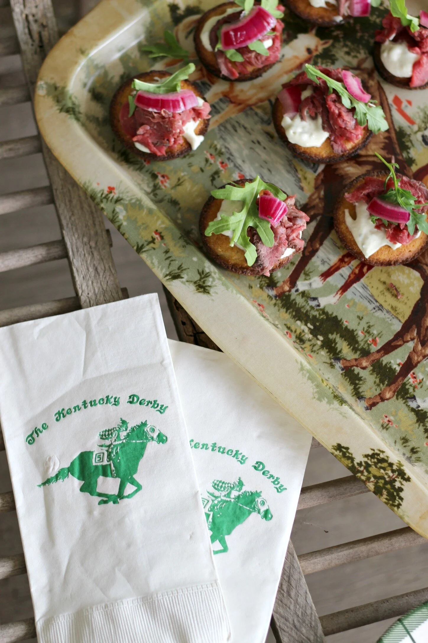 Beef Tenderloin Cornbread Crostini with Horseradish Blue Cheese Sauce