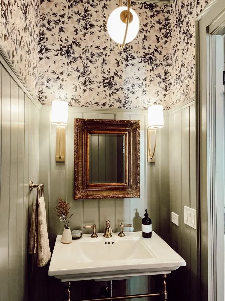  I am really into green paint right now and love the idea of a similar shade for the walls in here or vanity.  I also love the wallpaper and lighting in this space.  I don’t think I’ll be doing anything this feminine but I like the overall feel. 