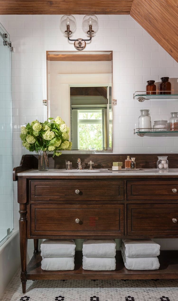  One thing that needs the most work is the sink area. We repurposed an old piece of furniture for our vanity + it needs to be refinished + I’d love to add an actual countertop finally similar to this!  I also love the wall mount shelving off to the s