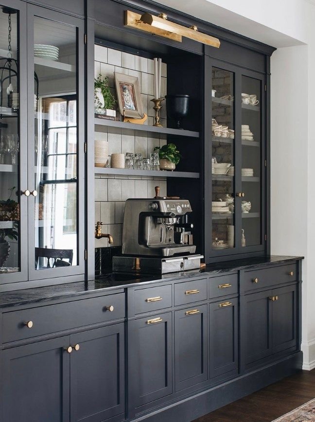 I love this cabinet layout with glass uppers, open shelving, and lots of drawers on the bottom.
