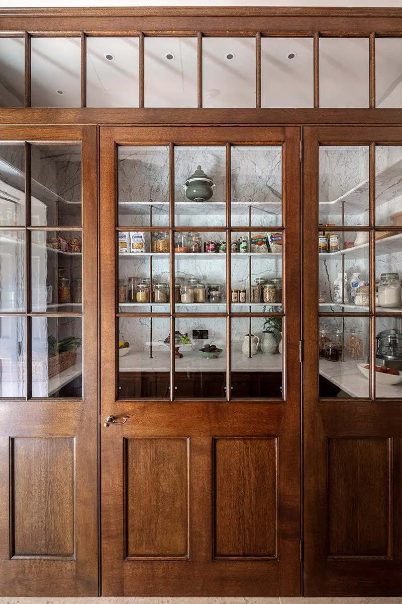 I definitely want to add more of a glass opening/door between the kitchen and pantry like this.