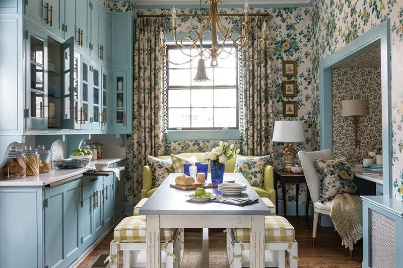 I especially love the style of cabinets here and how they utilize the height on that wall.