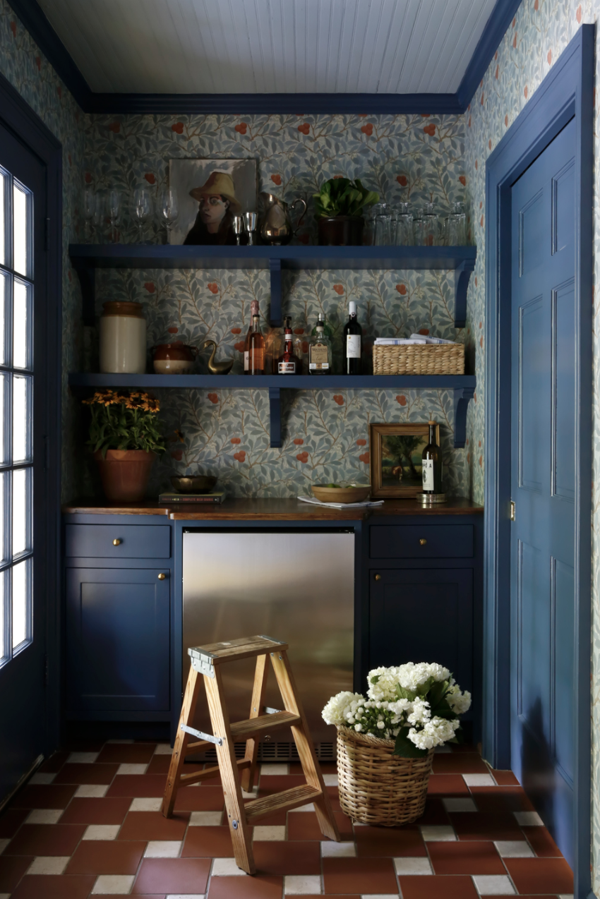 Total English Cottage feel with the colors, wallpaper, and slightly rustic details.