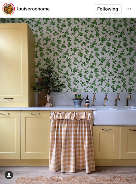 Yellow cabinets, AGAIN! That little skirted cabinet and this wallpaper is amazing!