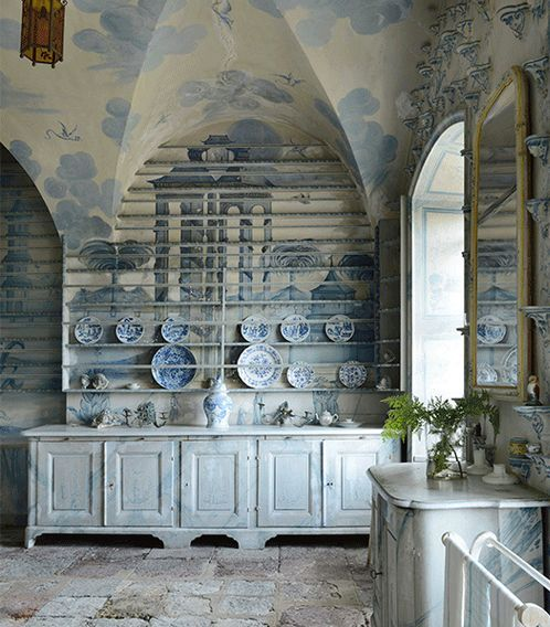 Love the mural wall that extends all over the lower cabinets- so elegant and unique!