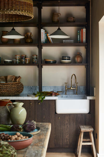 Perfect sink placement and love the unique upper shelving!