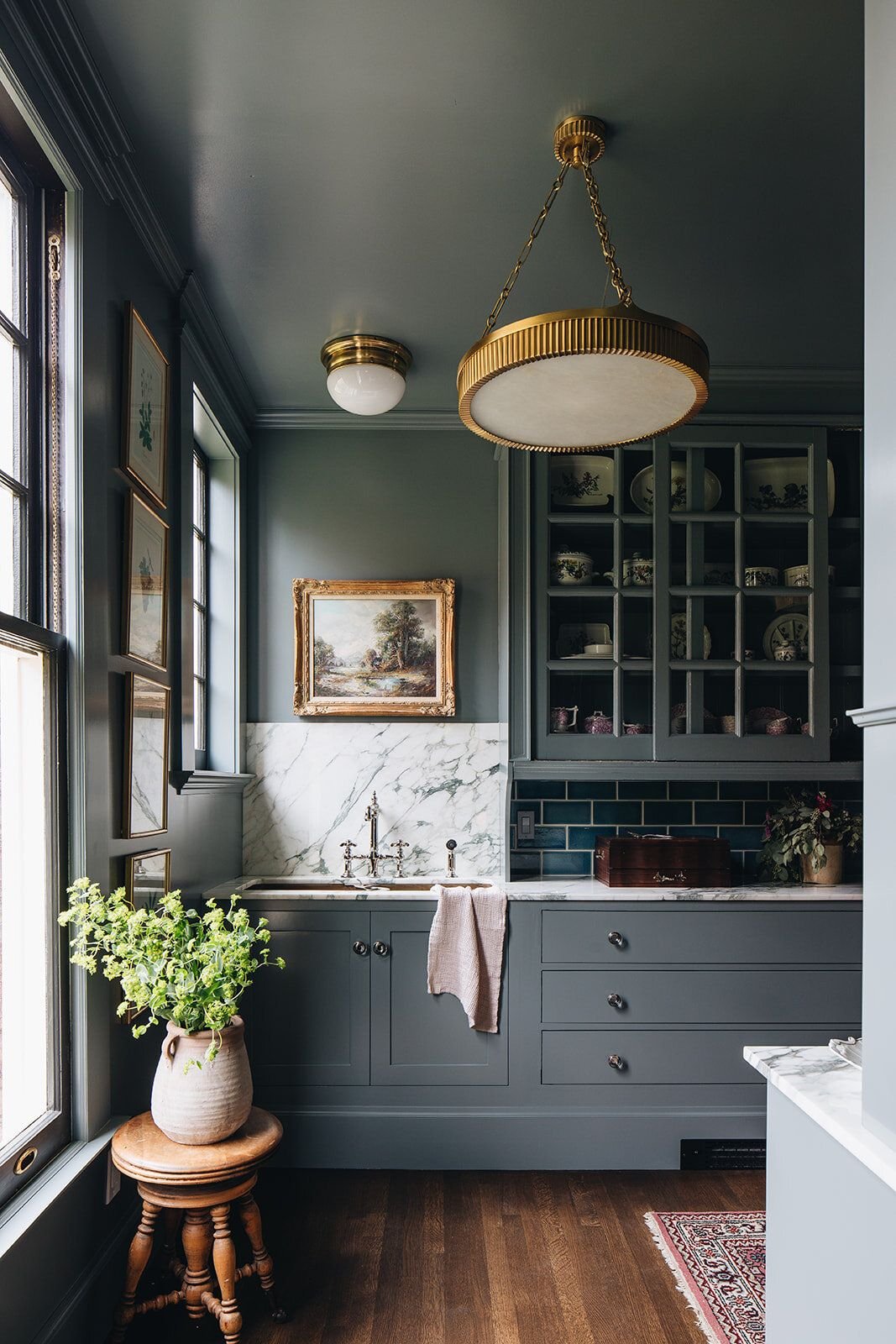 Love the sink placement and would love to do ours towards the end by the window like this!