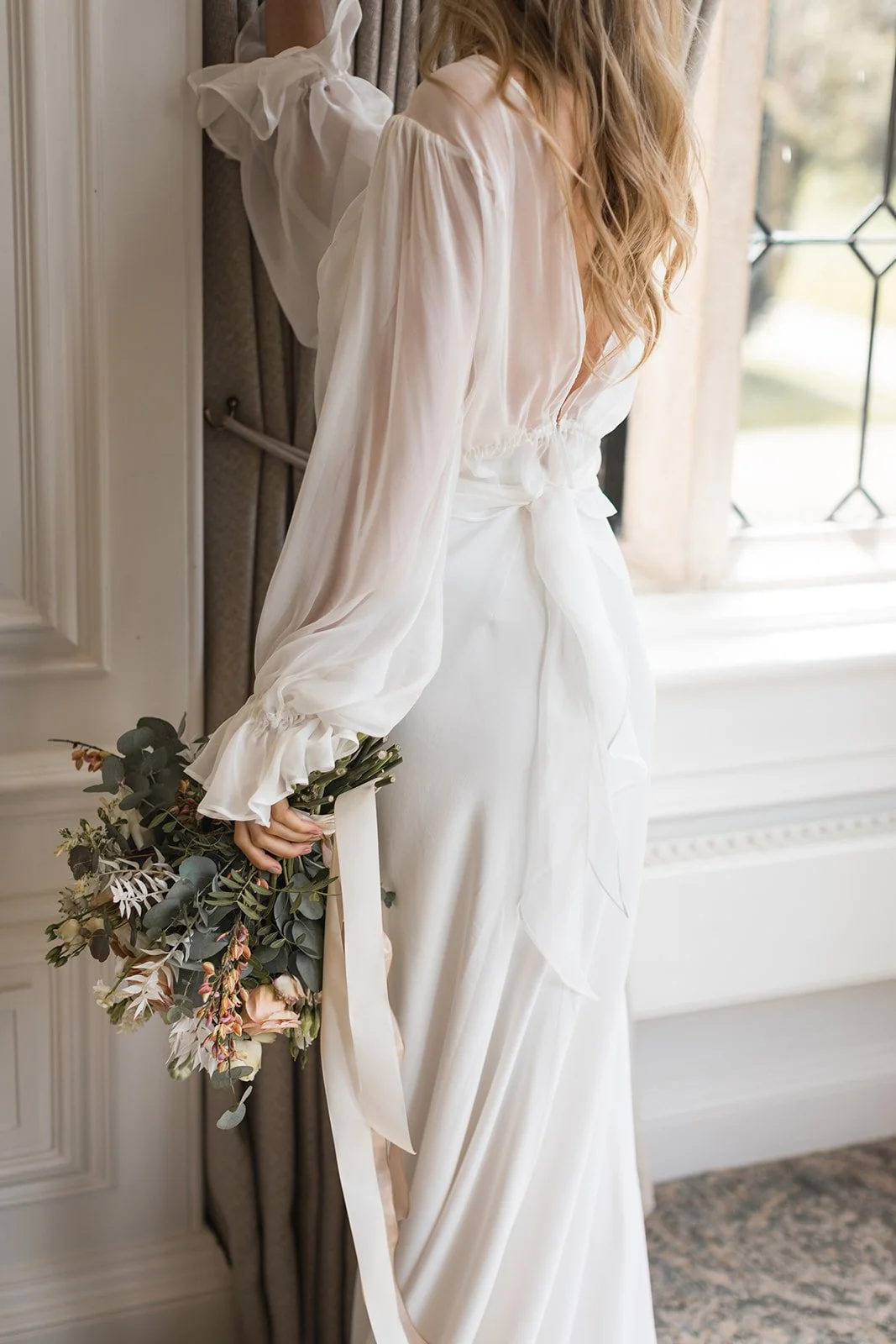 Modern romantic wedding dress by Rolling in Roses