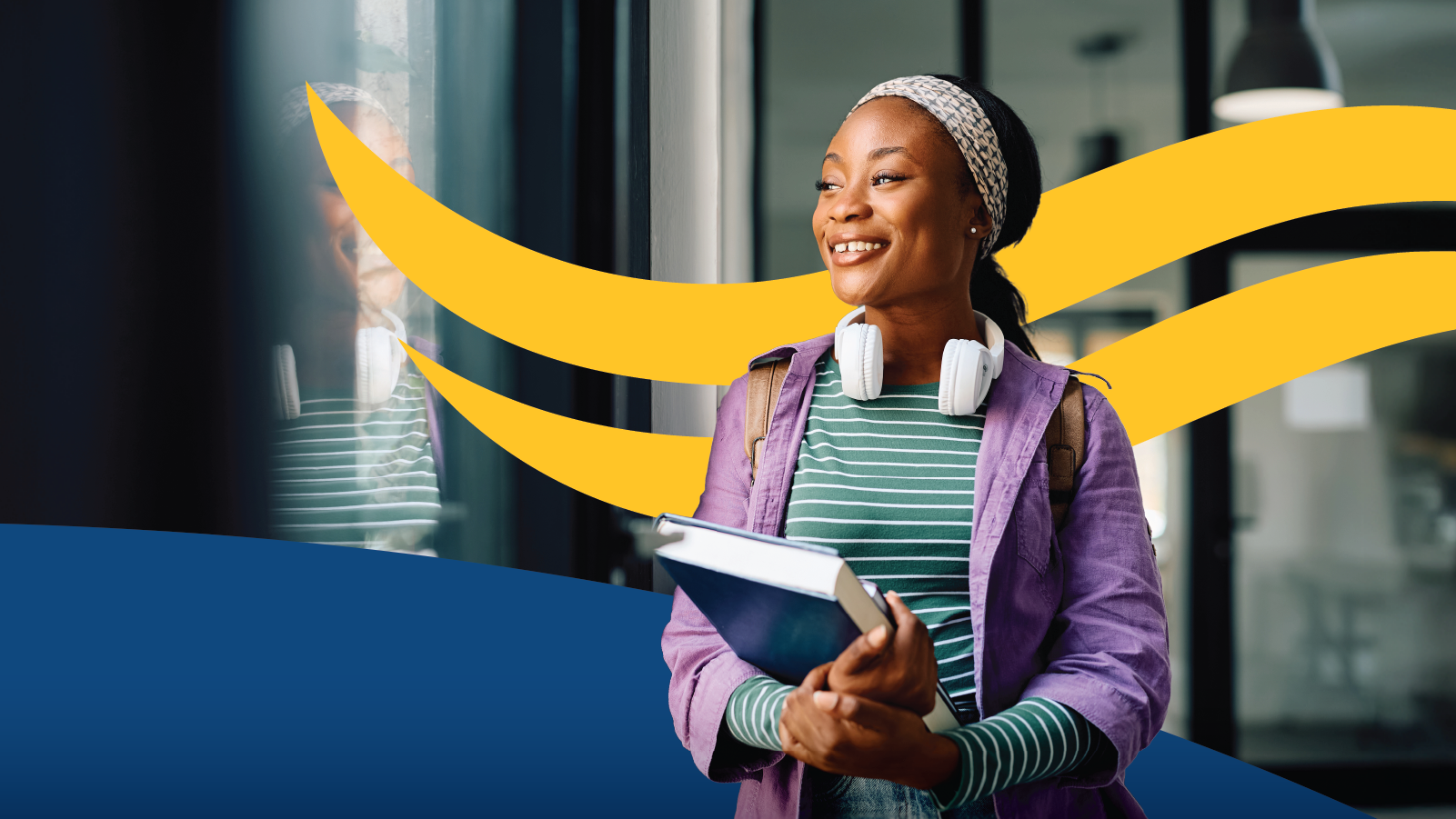 A young woman standing with a book and a backpack, smiling, with headphones around her neck, looking out a window. There are yellow curved graphic elements in the background.