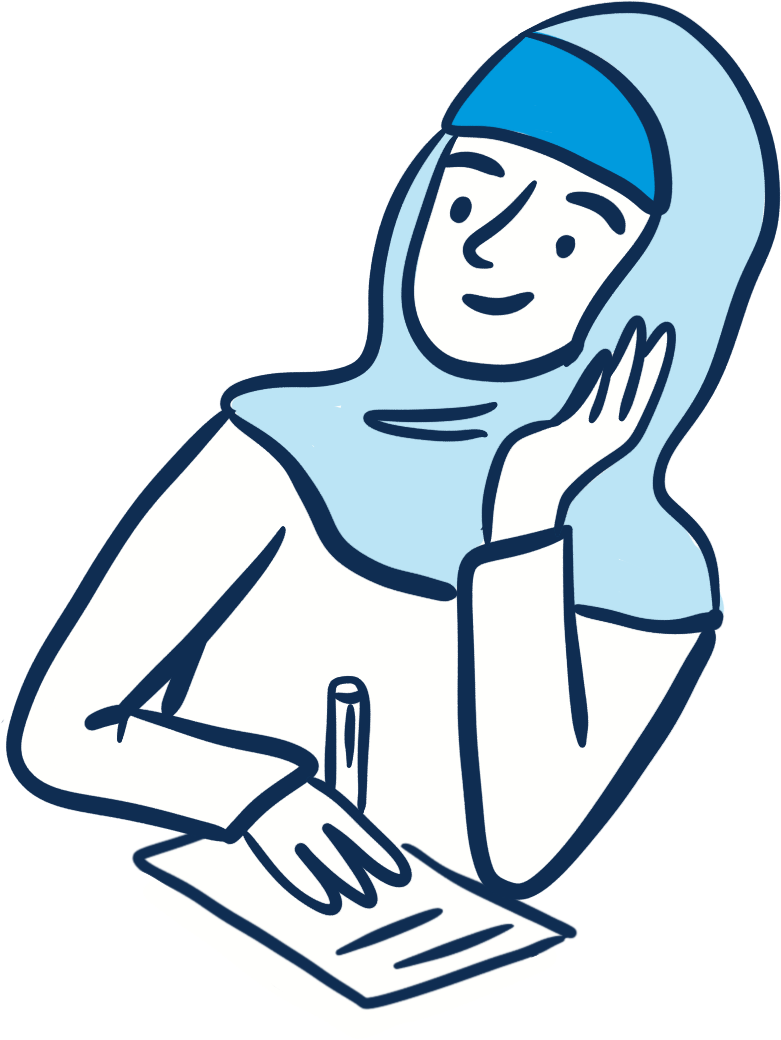 A woman in a light blue hijab, sitting at a desk, writing on a piece of paper, with her head resting on her hand, smiling