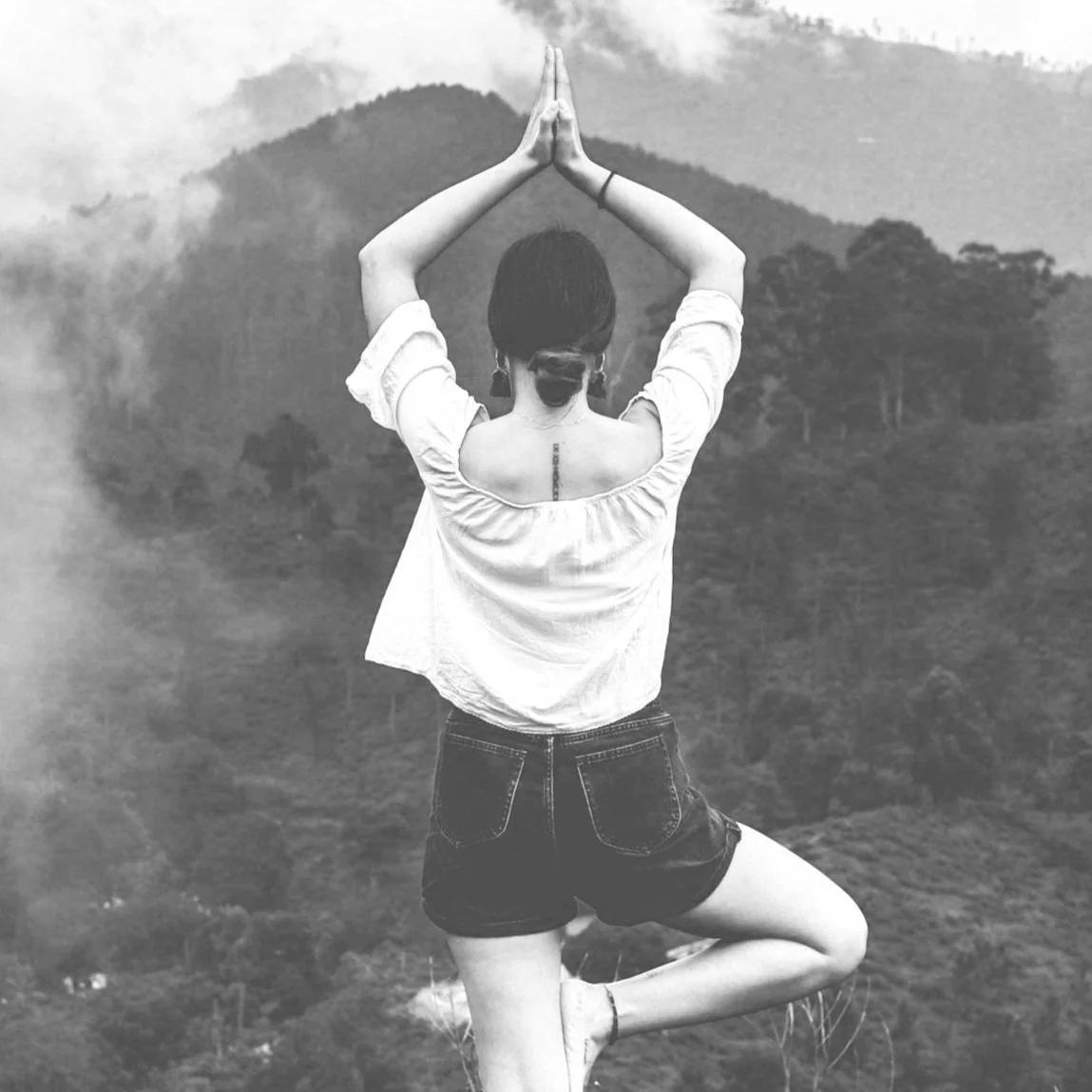 Yoga pose in the mountains - Tree pose