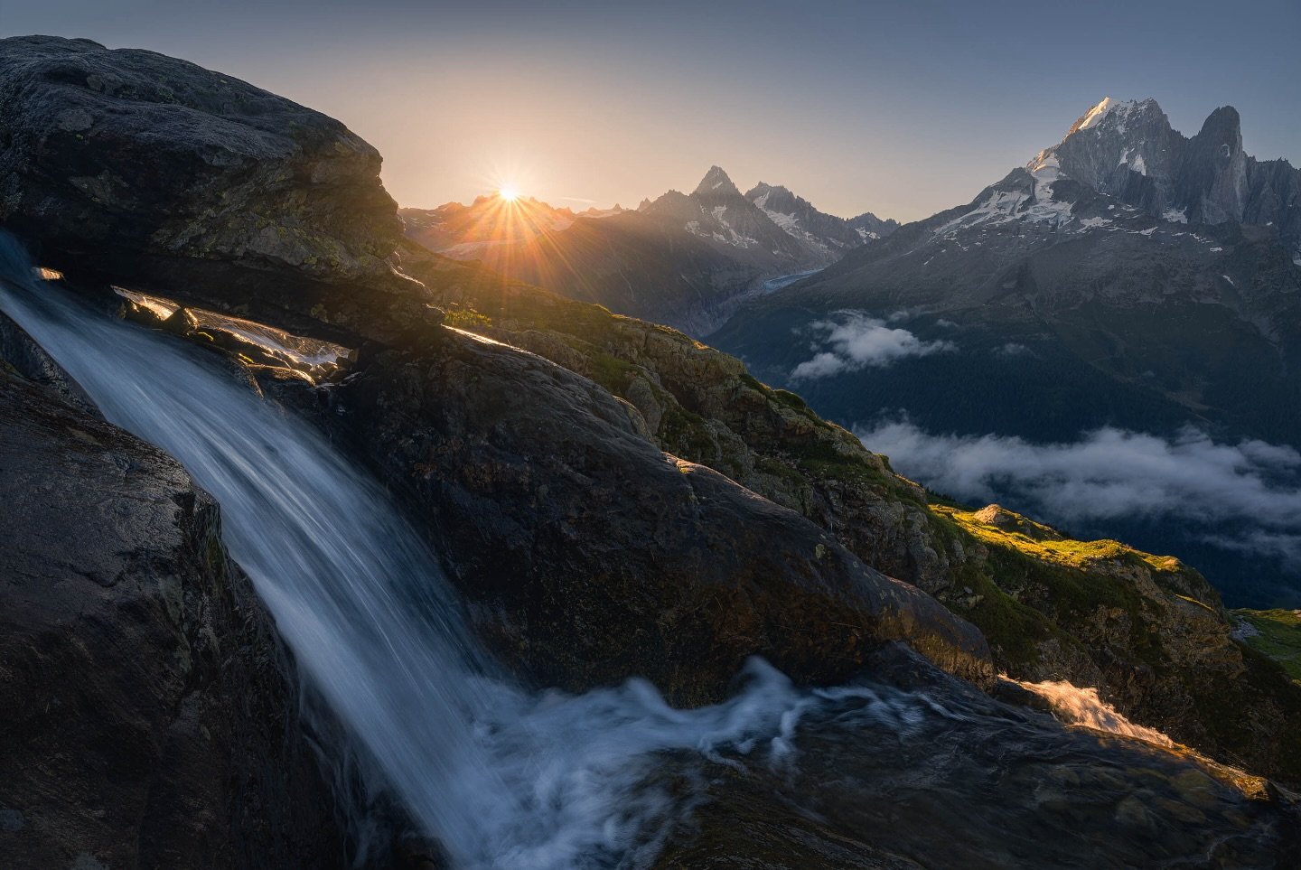 &quot;Glorious sunrise over the Drus&quot;
🇬🇧| After a spectacular sunset with a cloud inversion, followed by a night spent in the fog near Lake Ch&eacute;s&eacute;rys in the Mont-Blanc massif, the sunrise turned out to be less dramatic. Most of th