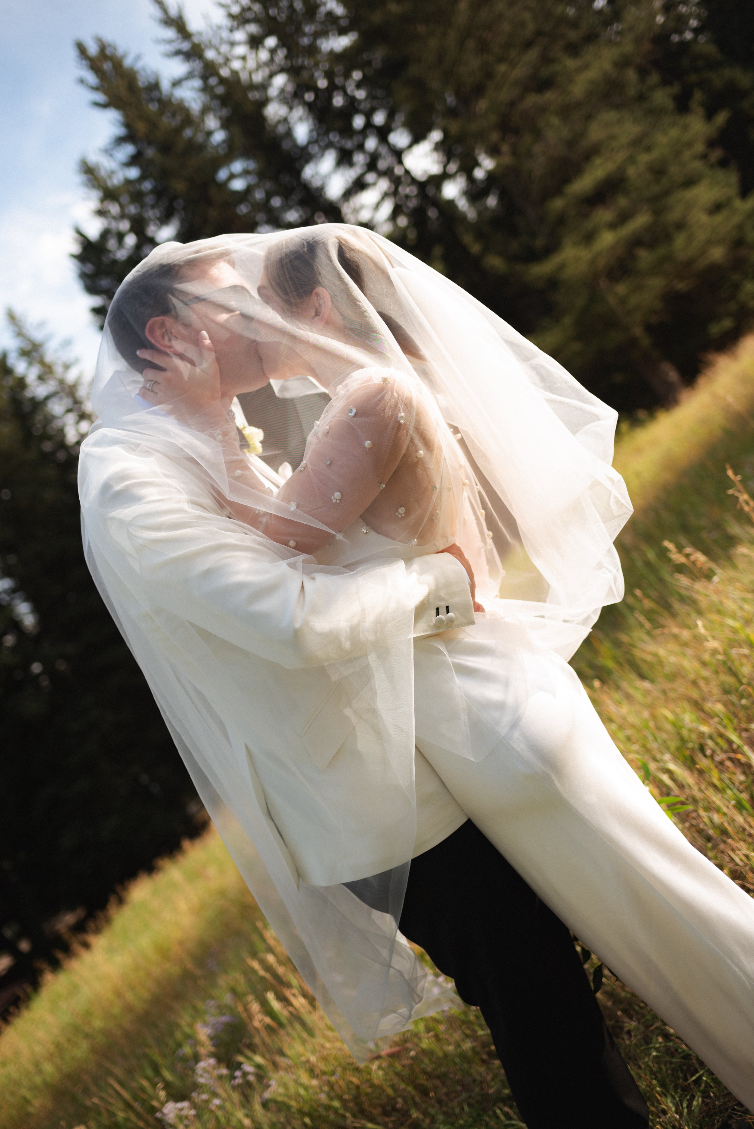 Jackson Hole Wedding Photographer. Film wedding Photography. Elizabeth Fillmore Bridal. Tracey Garcia Makeup Artist. White Tent Wedding. Tom Barnett Tux