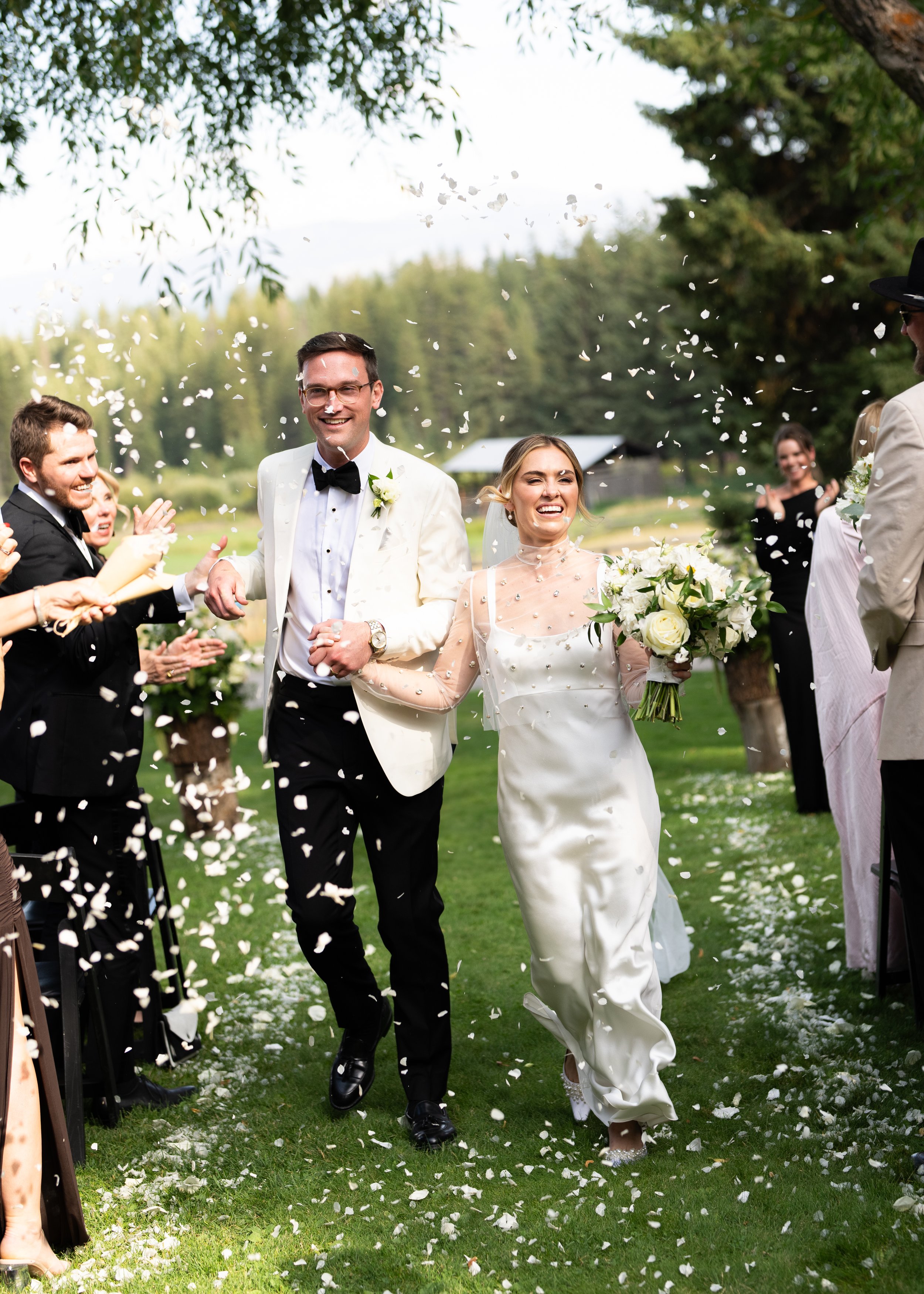 Jackson Hole Wedding Photographer. Film wedding Photography. Elizabeth Fillmore Bridal. Tracey Garcia Makeup Artist. White Tent Wedding. Tom Barnett Tux