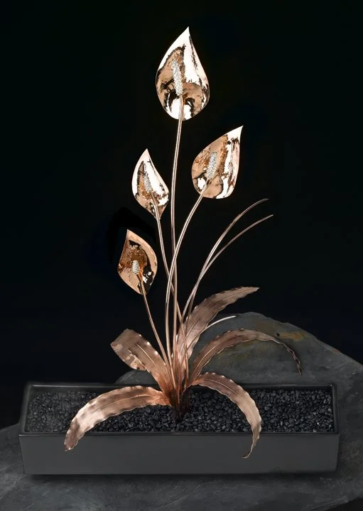 Transform your space with the exquisite hand-sculpted Peace Lily Masterpiece, featuring detachable brooches for a touch of elegance in any setting.