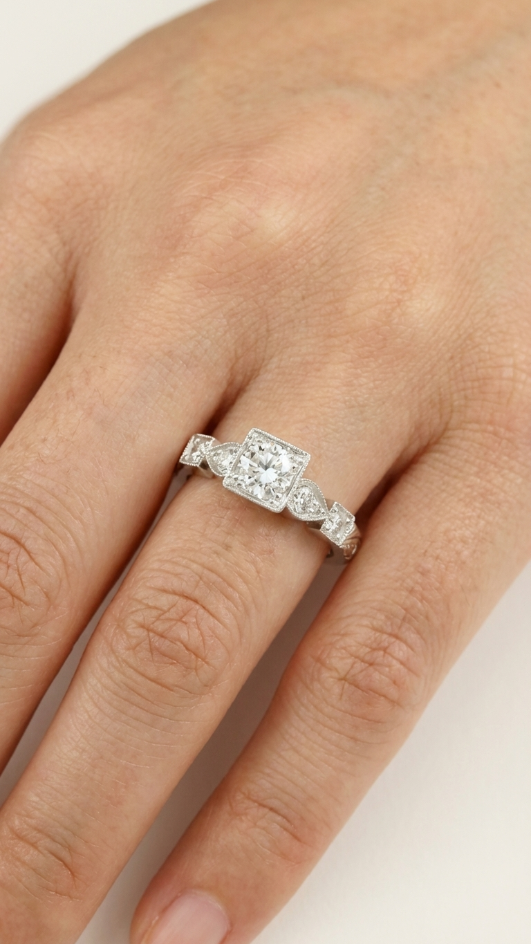 stark jewelers bespoke engagement vintage diamonds ring collection on a model