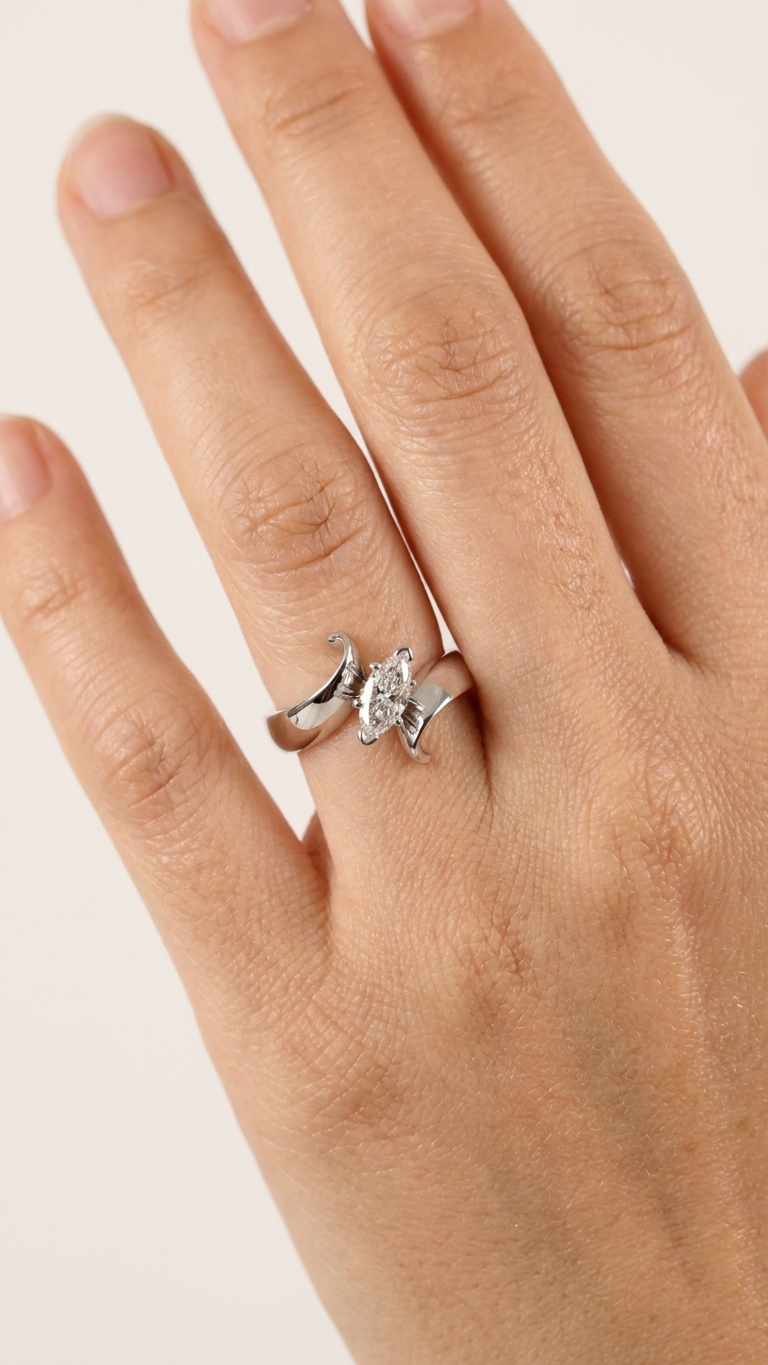 stark jewelers bespoke engagement solitaire ring collection on a model