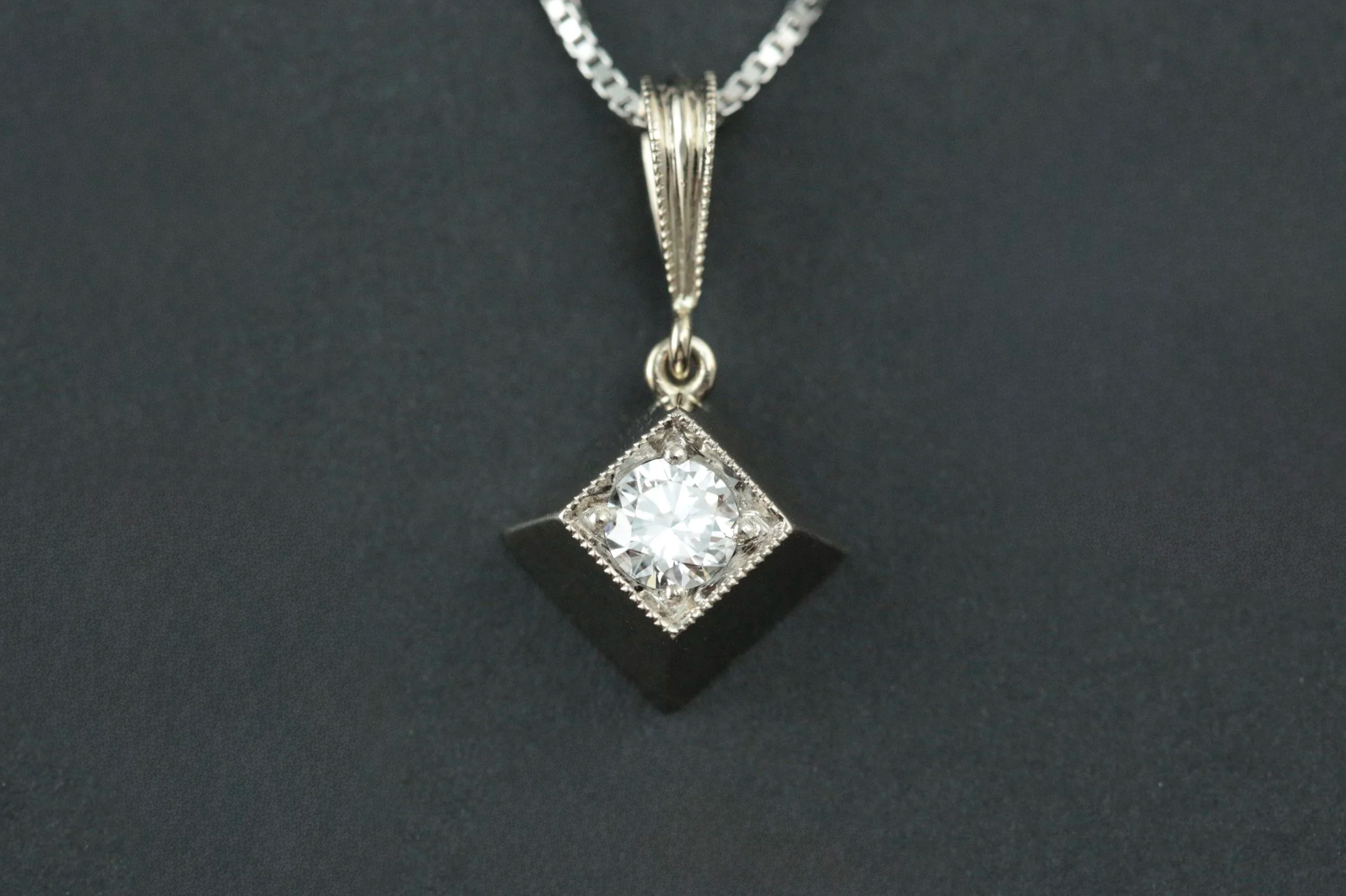 Single Pyramid Diamond Pendant. 14k white gold with Diamond 0.35 carat round brilliant, VS2/H. Designed and handcrafted by Larry Stark