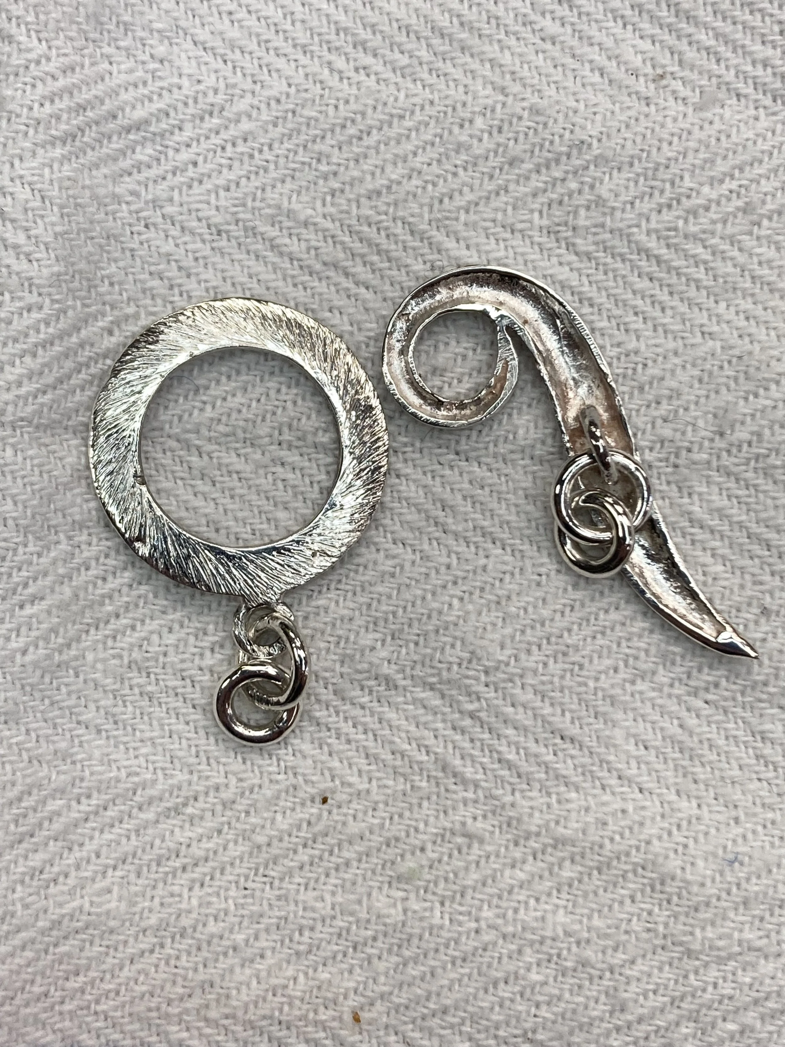 cleaned & polished the original silver clasp of the pearl strand