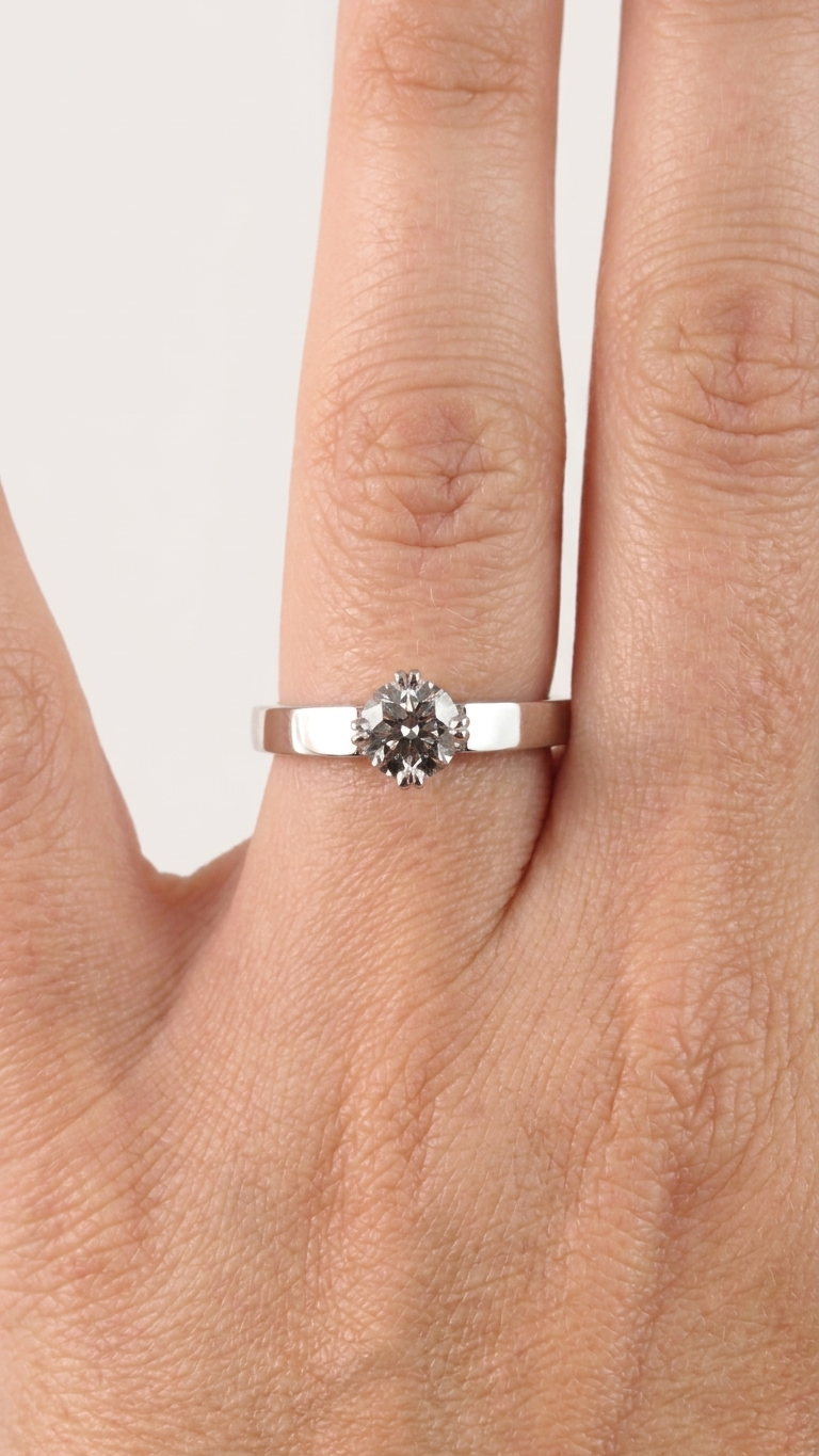 stark jewelers bespoke engagement solitaire ring collection on a model