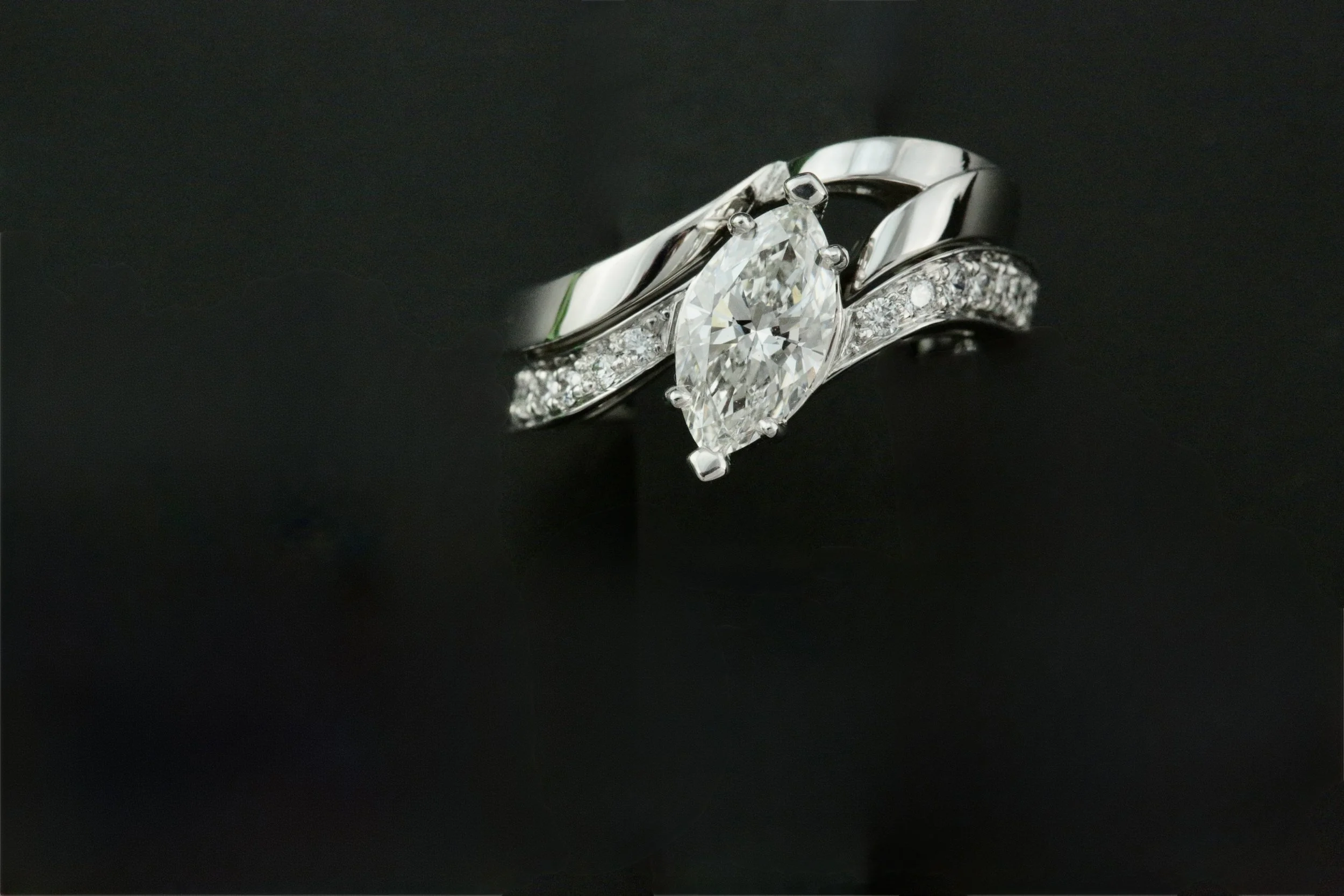 custom make 14k white gold natural diamond engagement ring and wedding band set designed and crafted by Stark Jewelers in Sacramento