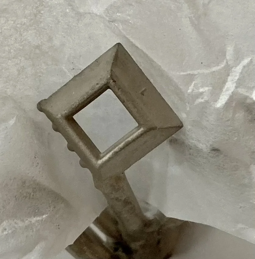 Behind the Bench at Stark Jewelers studio in Sacramento. We started with the raw metal casting of the pyramid heads for the pendants.