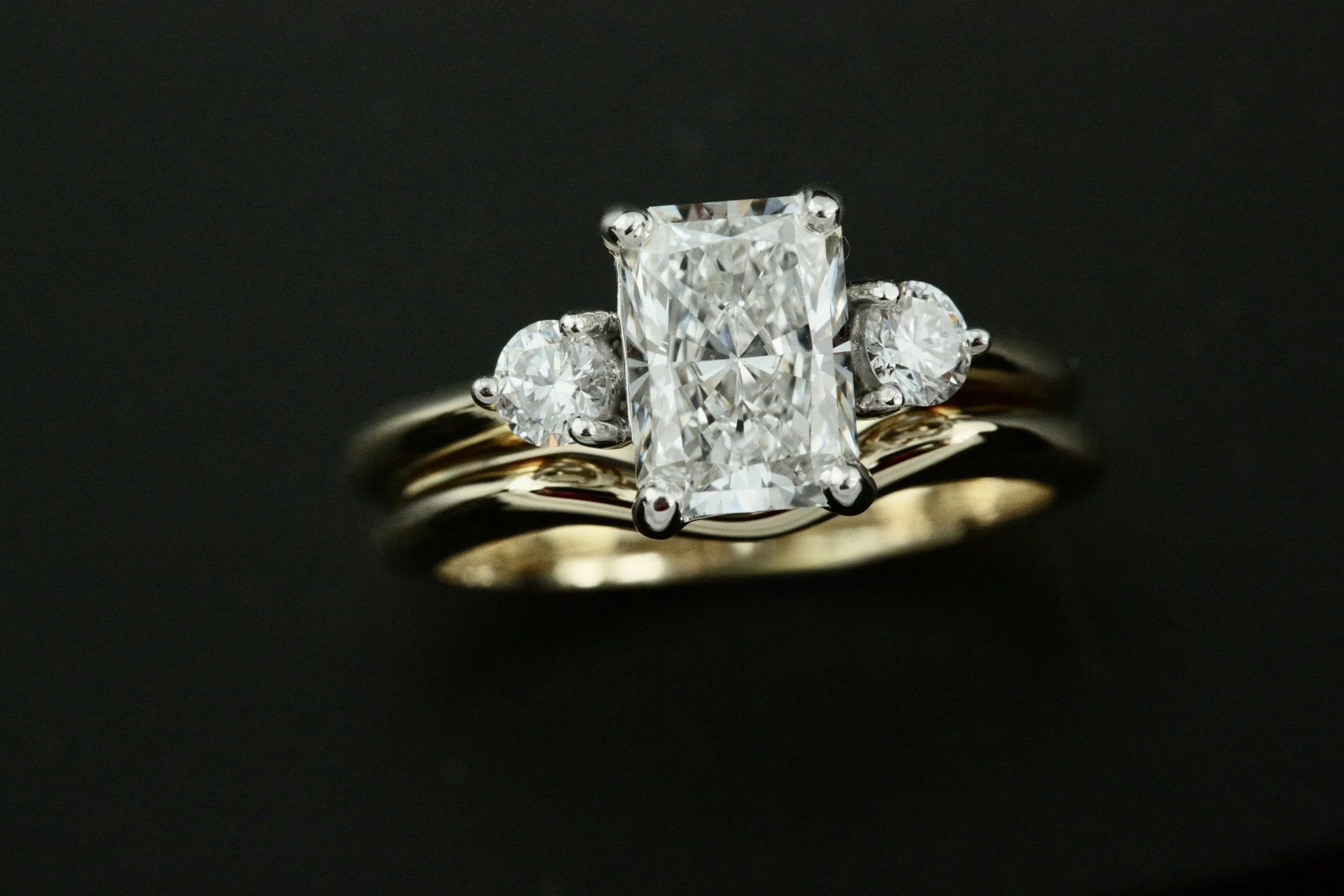 custom make 14k yellow gold diamond engagement ring and wedding band set designed and crafted by Stark Jewelers in Sacramento