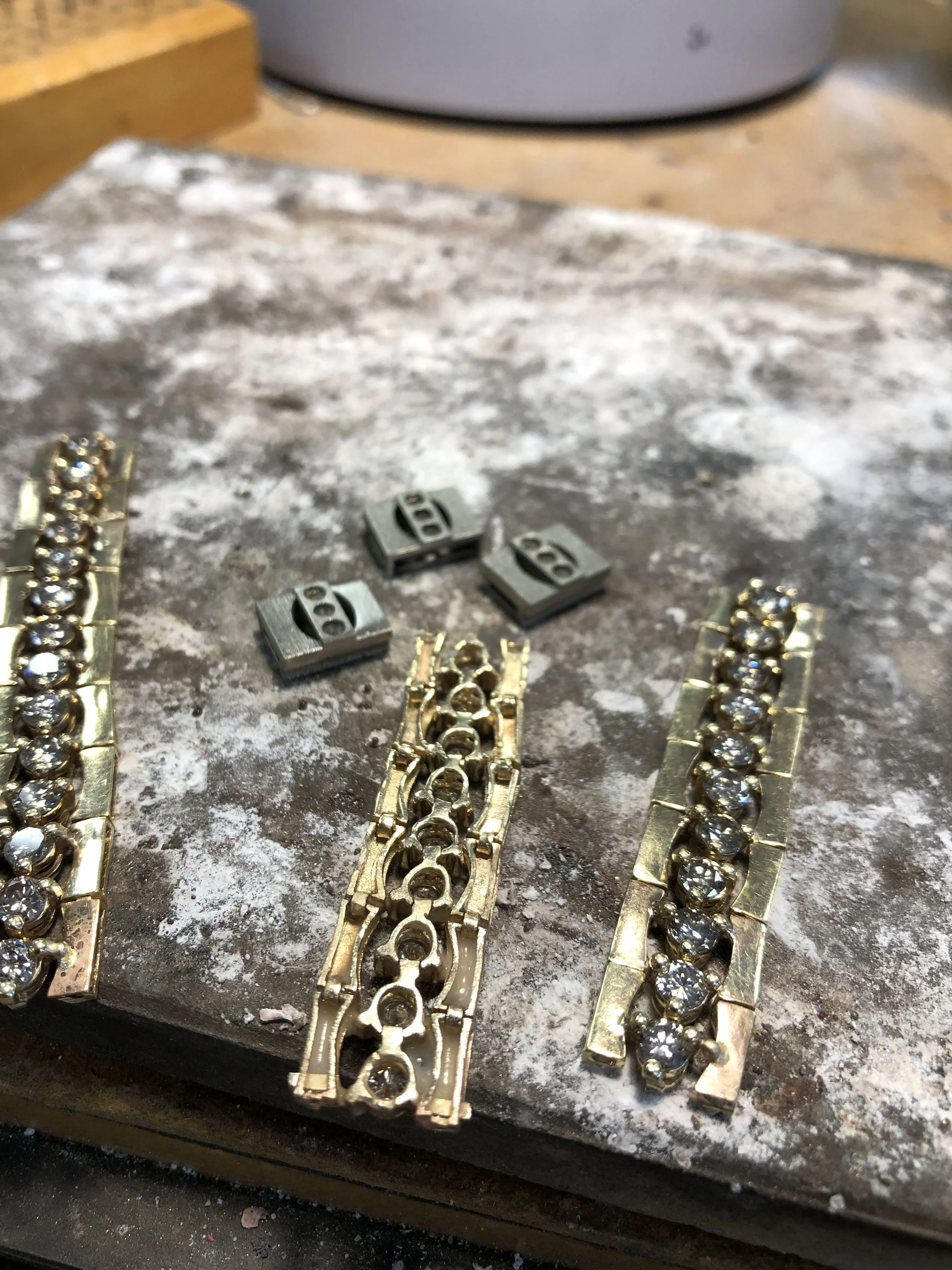 At Stark Jewelers, our master jeweler engineered three custom 14k white gold links, completely flush with the original profile, featuring pave diamonds set perfectly at the center.