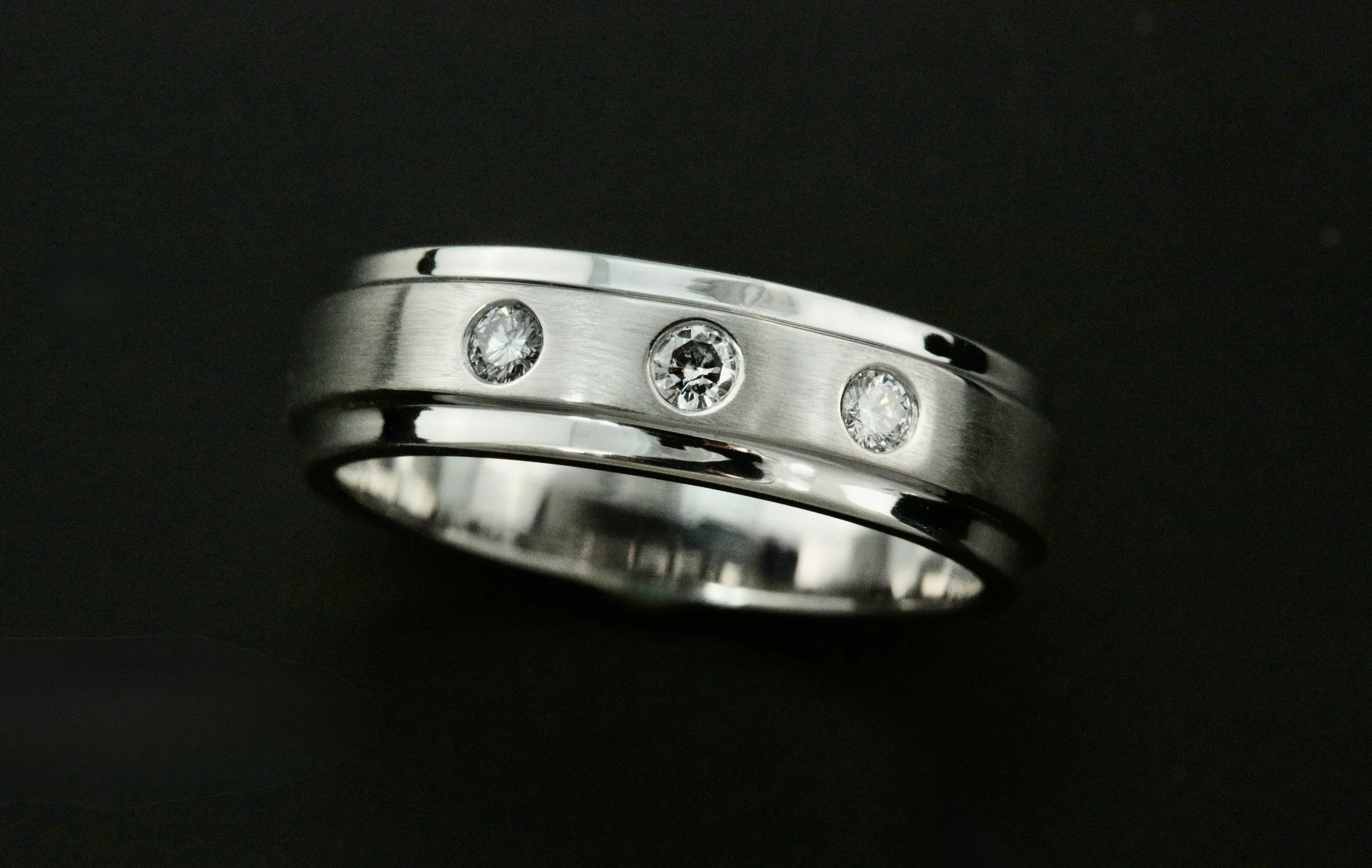 custom make men's 14k white gold diamond wedding band designed and crafted by Stark Jewelers in Sacramento